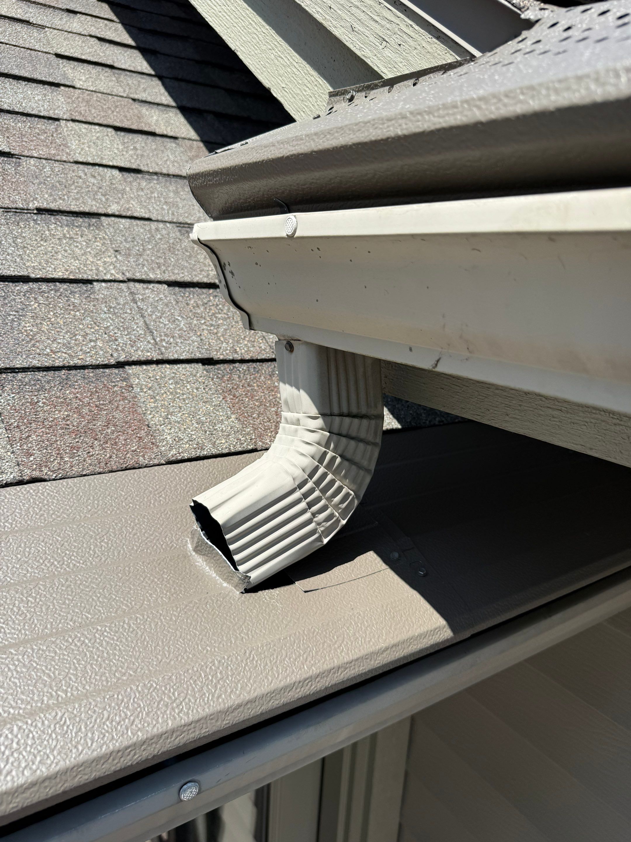 Custom Gutter Helmet Protection for Residential Roof in Suttons Bay by Rainbow Seamless Systems