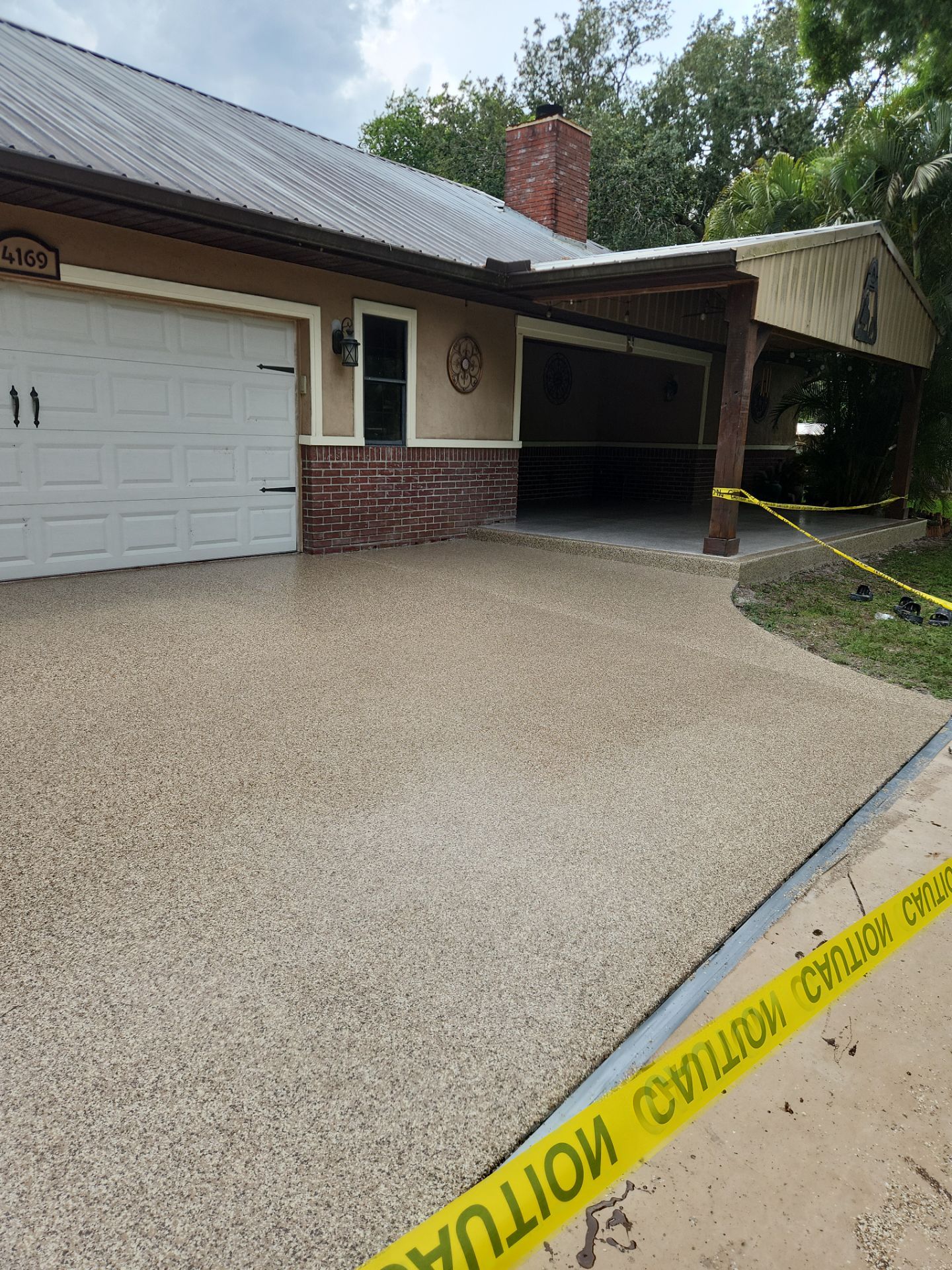 Driveway & Patio Recoating using Polyaspartic by Revelry Coatings