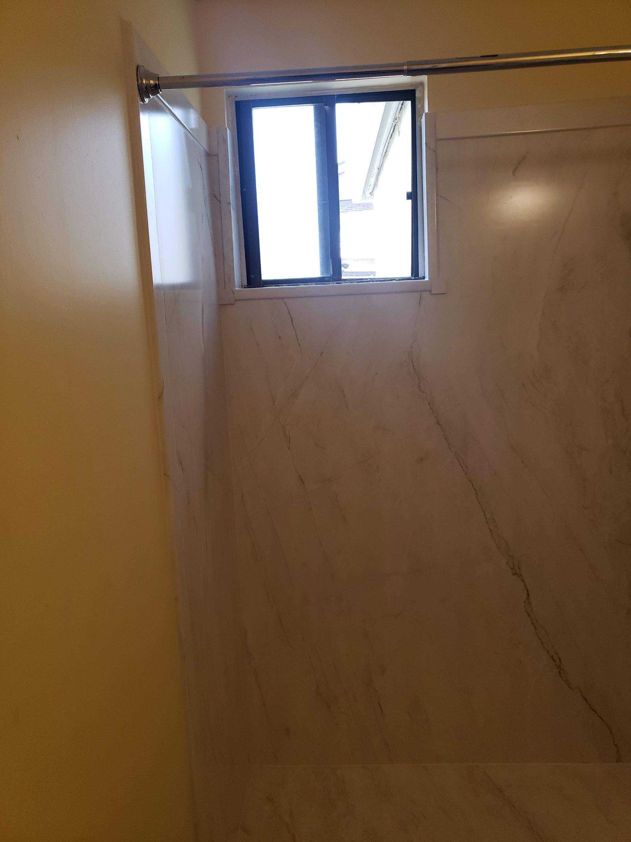 Studs to Stunning: Bathroom Remodel with FlexStone by McCray's Handyman, Inc.