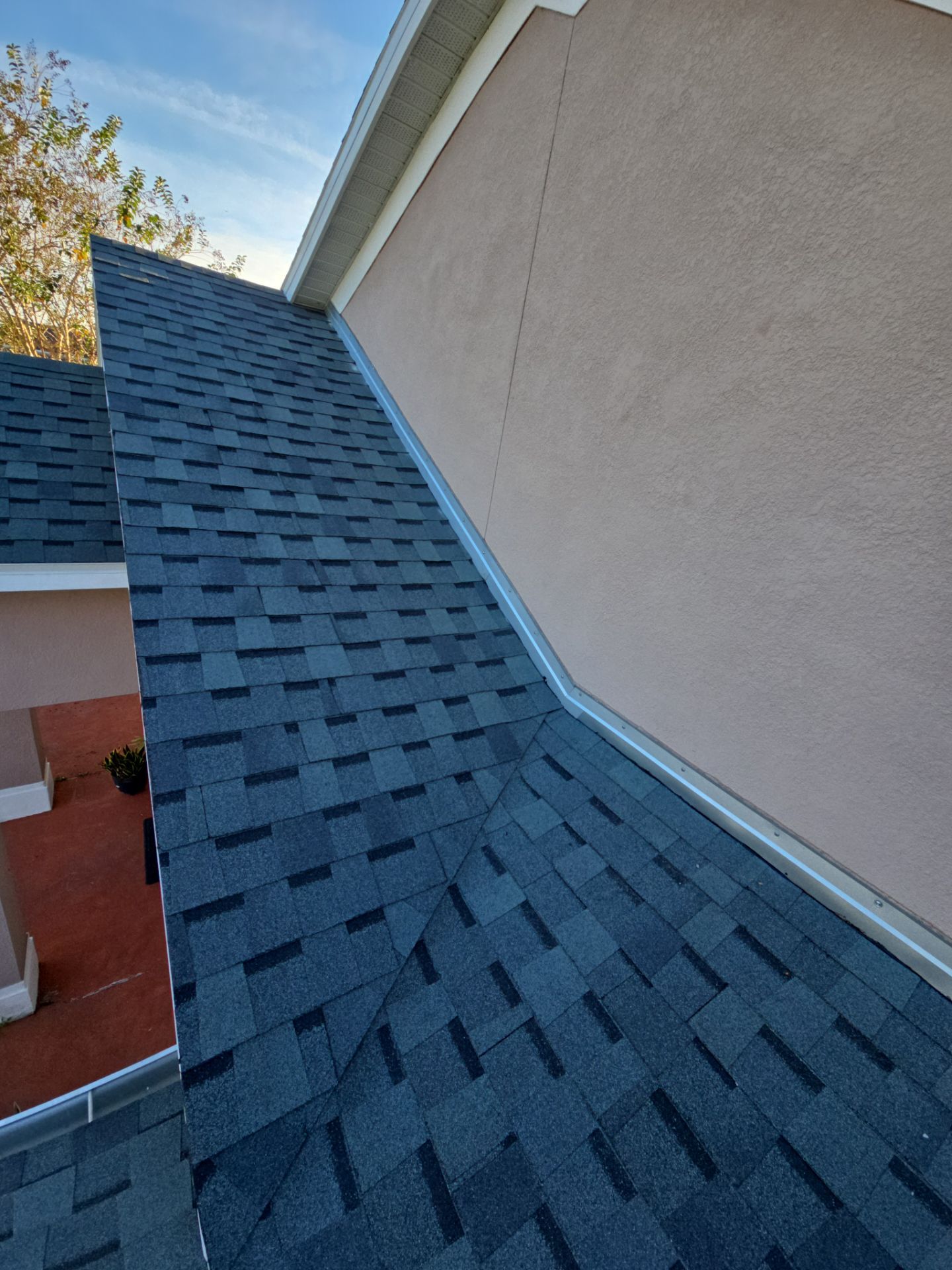 Atlas Pinnacle Pristine Architectural Shingle Roof Replacement in Kissimmee by Fortified Roofing Solutions Corp.