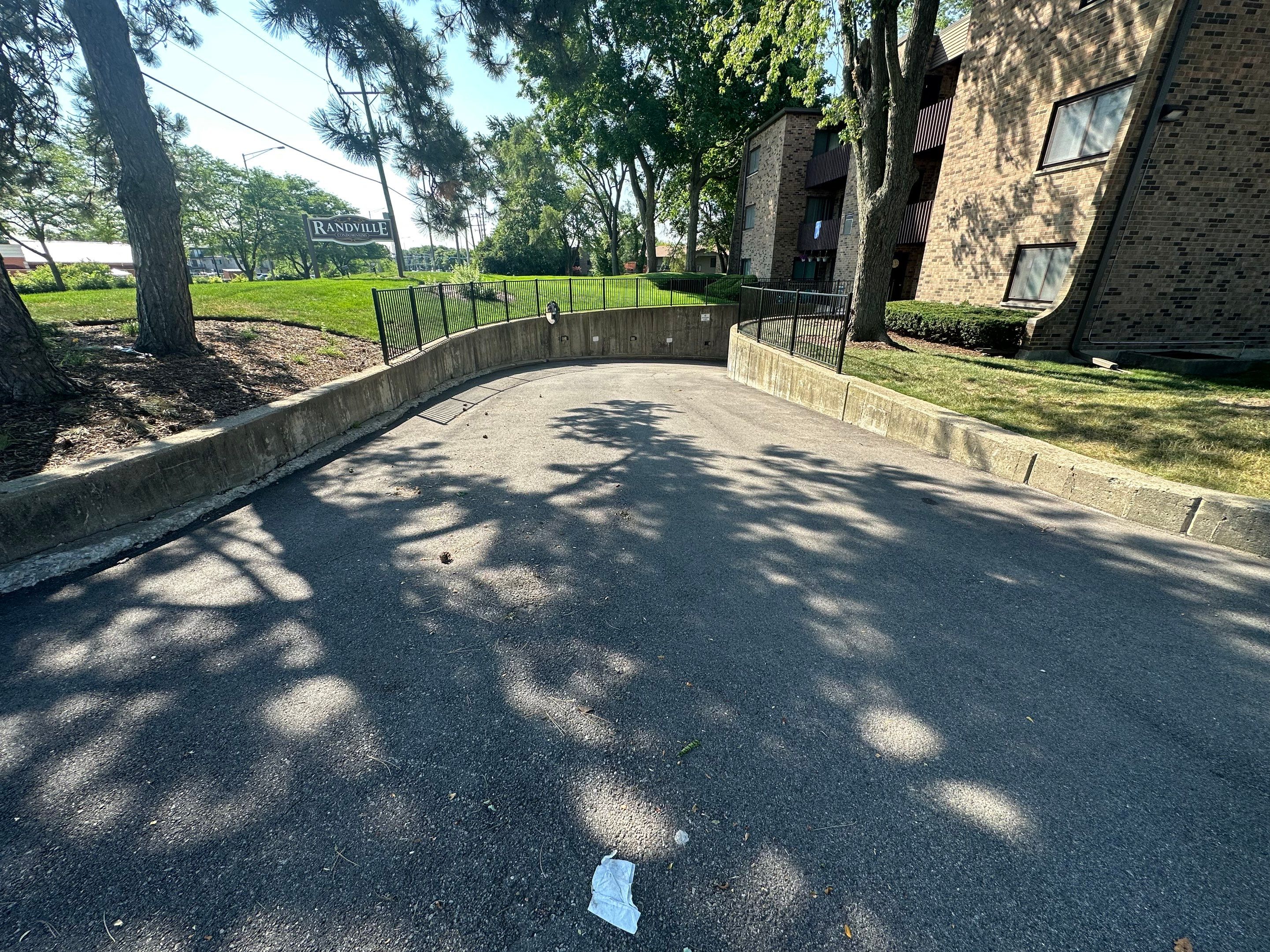 Parking garage using Hot water by Northern Power Washing LLC.
