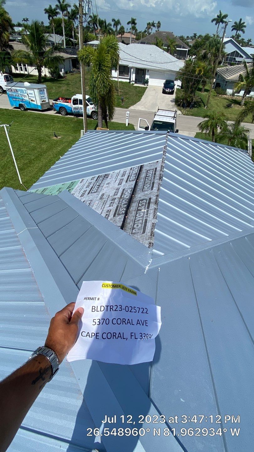 Residential Roofing Installation using Standing Seam Metal by Protek 