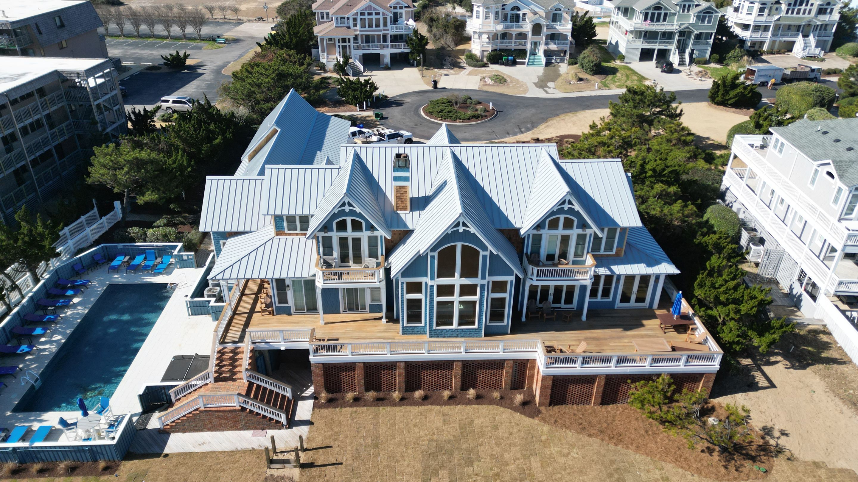 Large Metal Roof Transformation by Gallop Roofing & Remodeling, Inc.