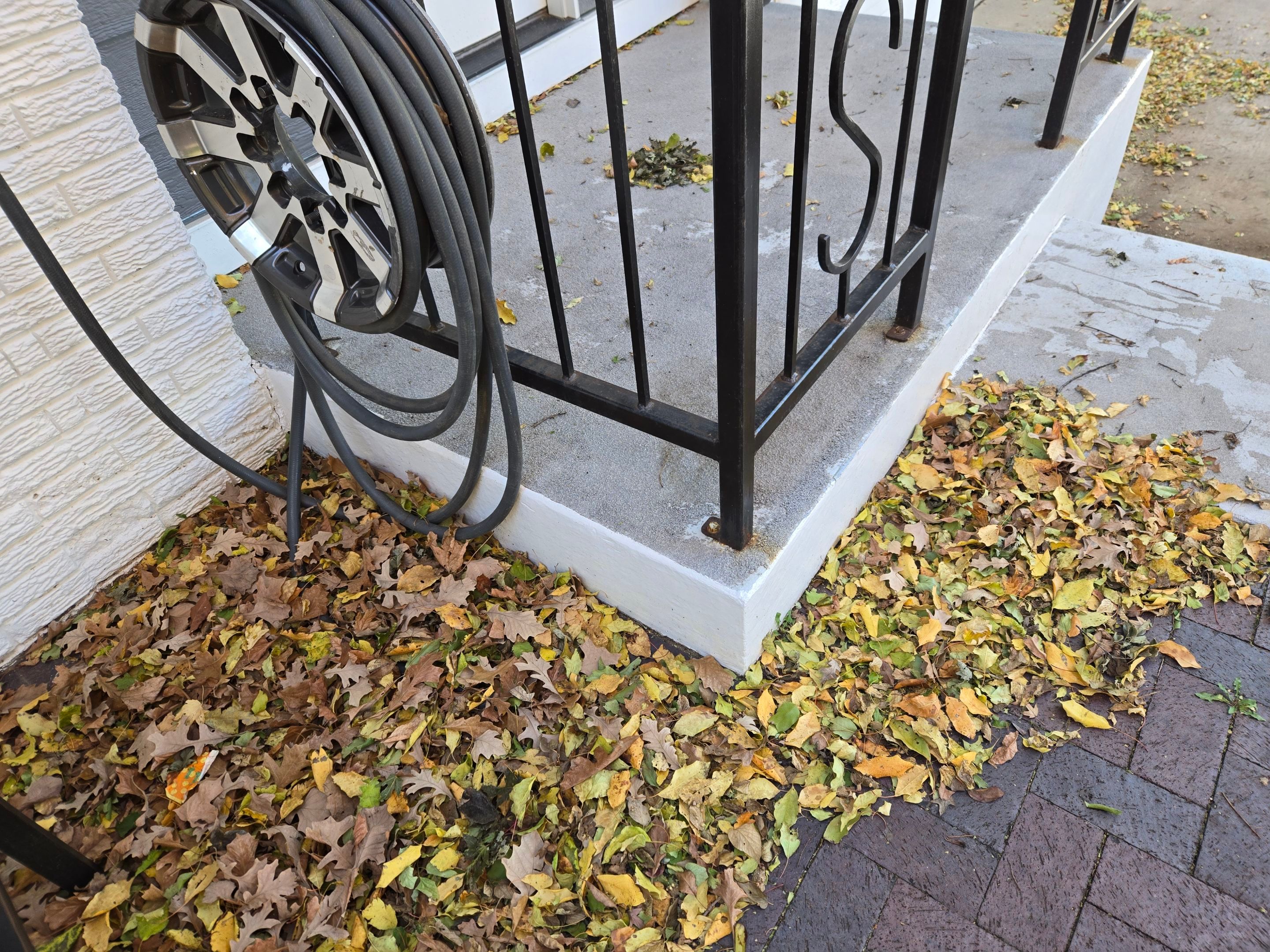 Grey Polyaspartic Porch and Stair Resurfacing in Sioux Falls by Select Painting, Coatings & Garage Cabinets