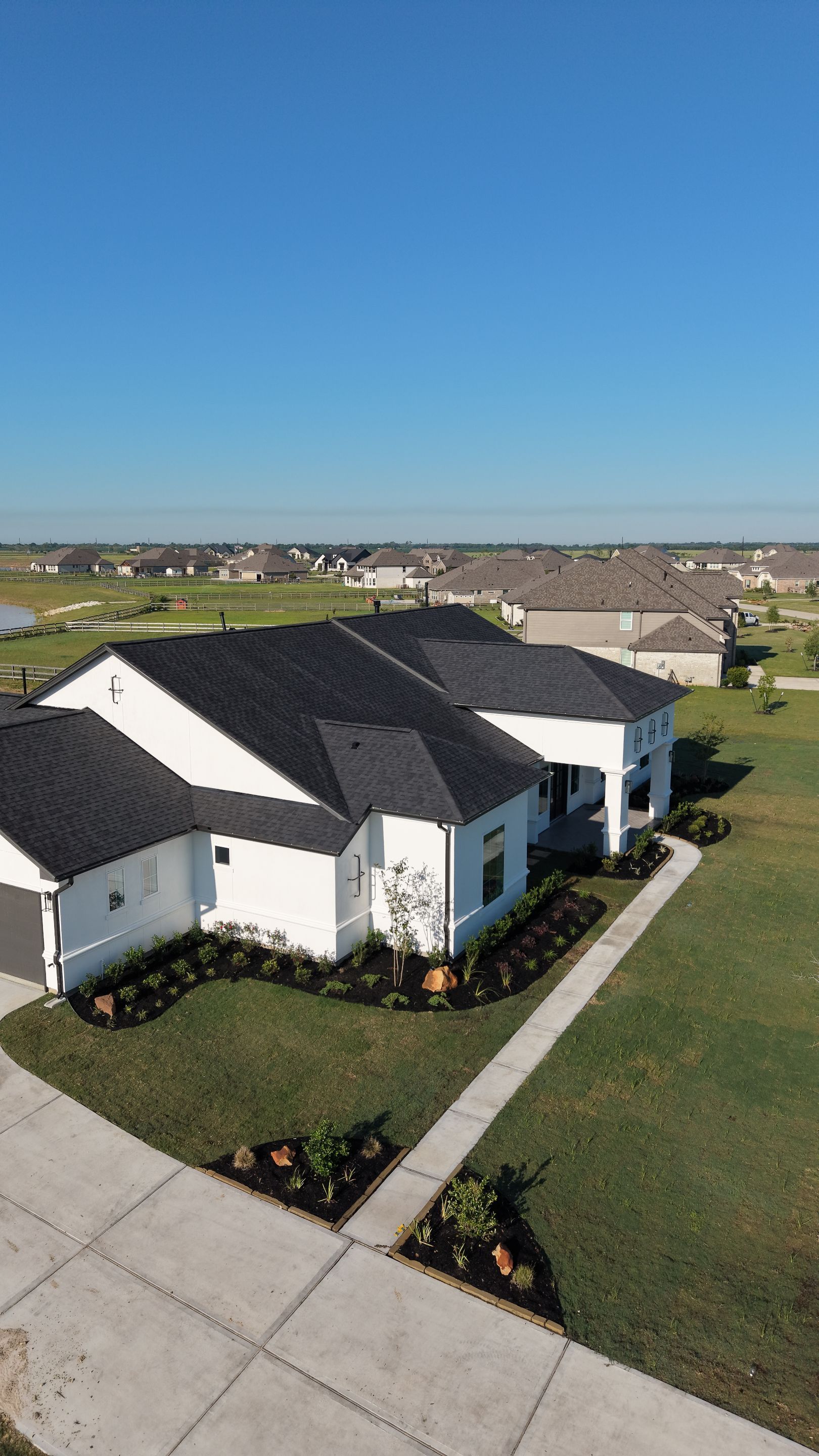 Custom Stucco Masterpiece with Precision Foam Detailing – Waller, TX by Apex Conventional Stucco Llc