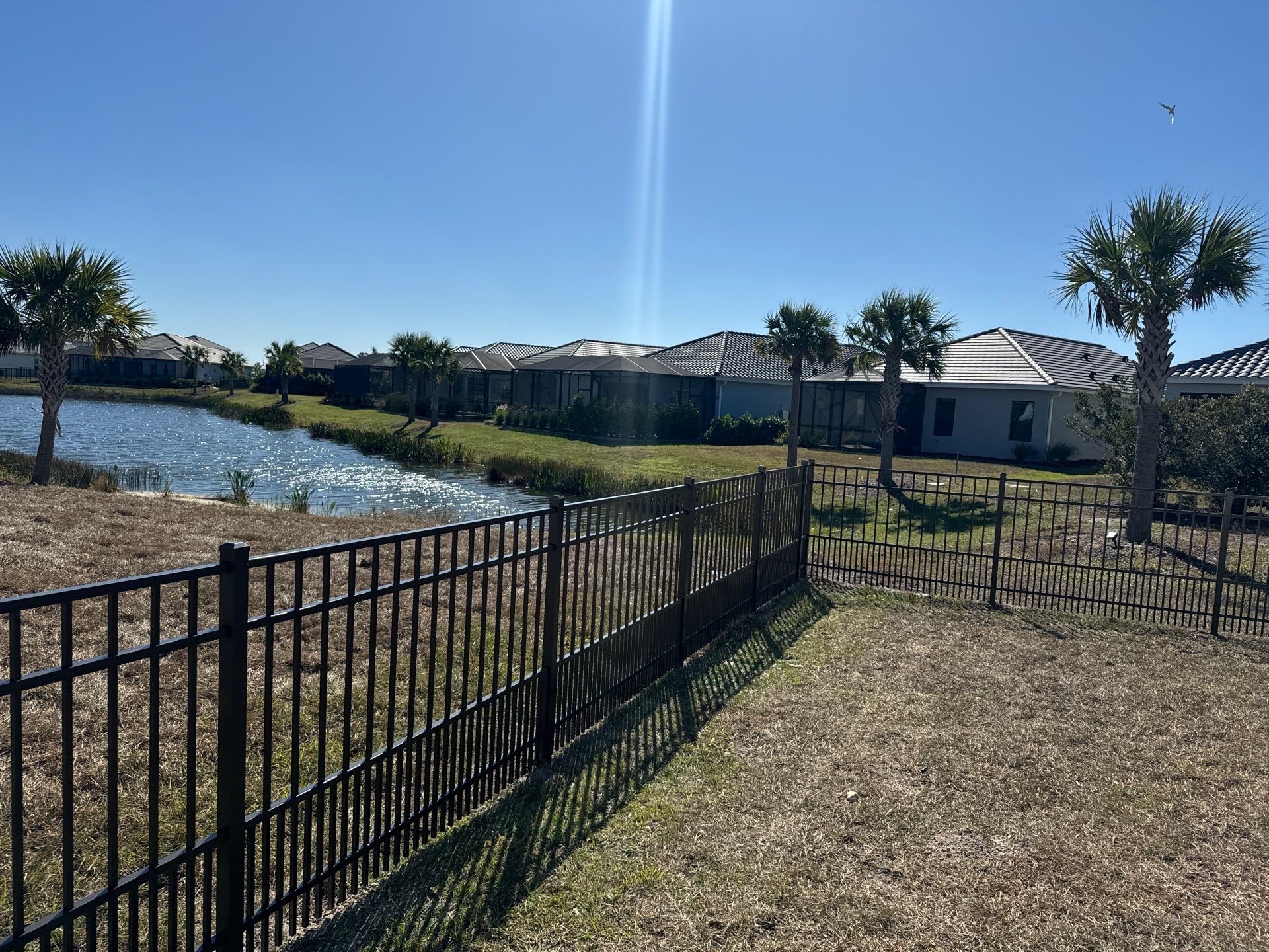 Aluminum Fence Installation using 4Ft 3 Rail Bronze Puppy Picket Aluminum Fence by Asap fence and gates, LLC