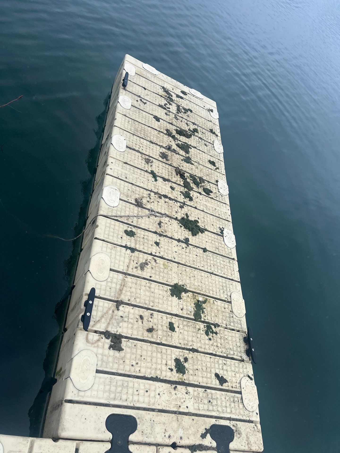 Power washing of floating dock by Northern Power Washing LLC.