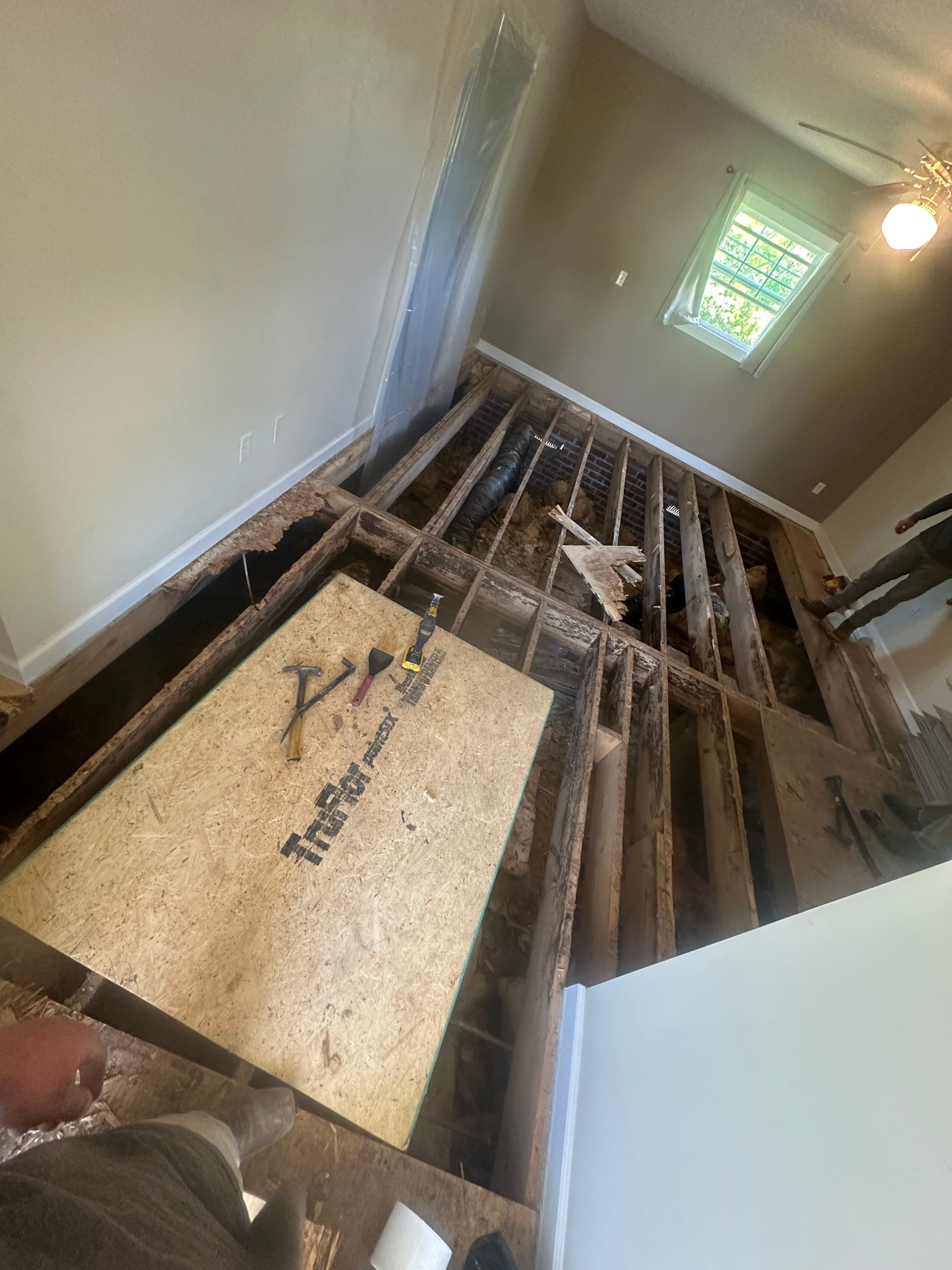 Structural Repairs inludiing sub-floor removal, new floor joists installed, girder replacmeent and dropped girder installed. by Impact Crawlspace