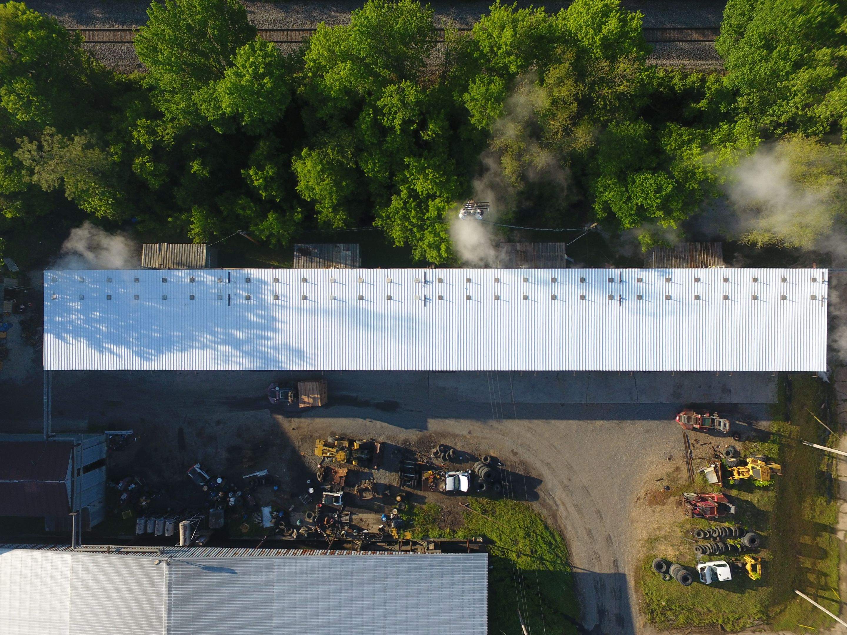 Commercial Roofing Installation using Aluminum Roofing panels by Hostetler Roofing