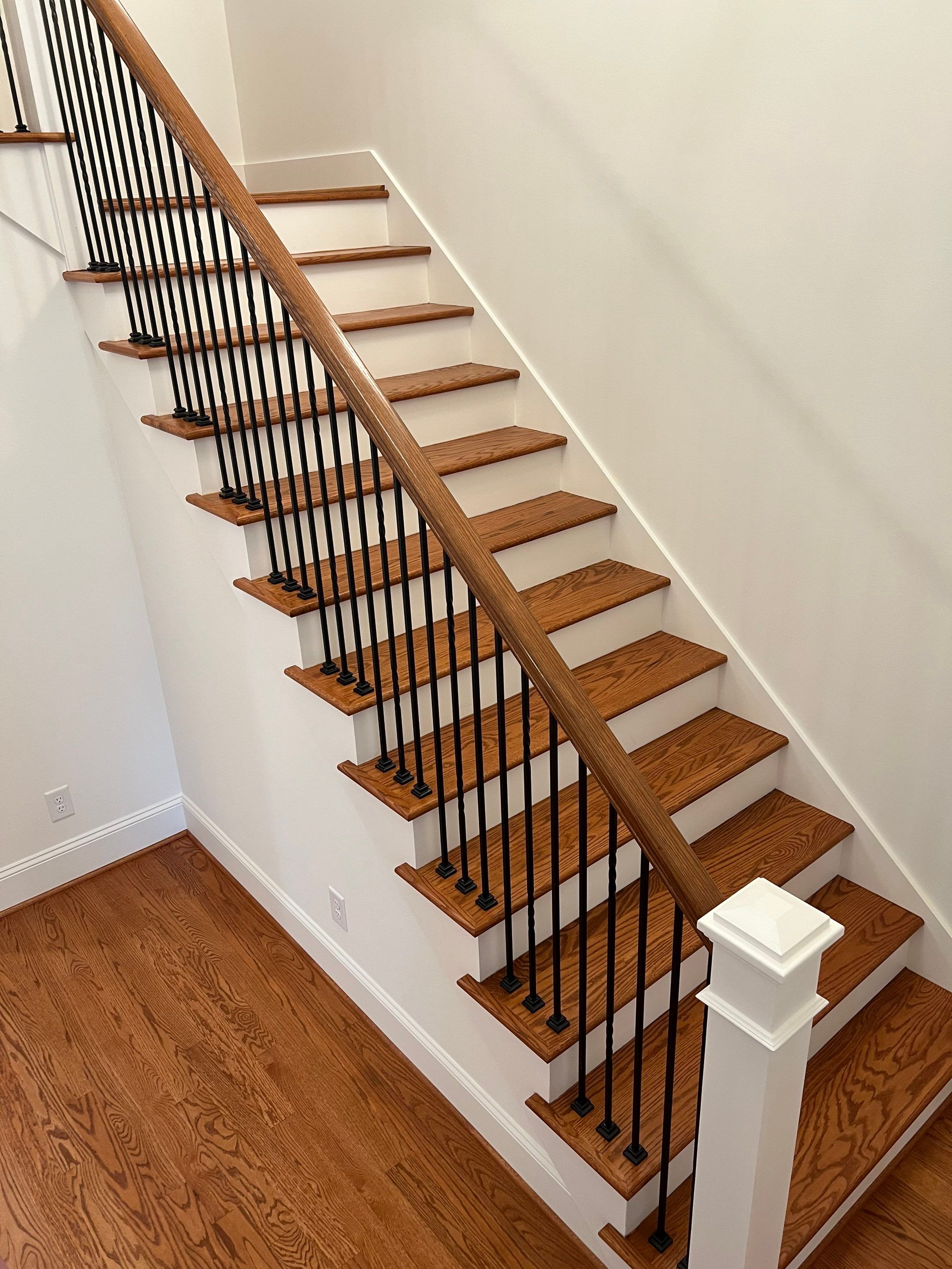 New construction home with a nice warm color by Accent Custom Floors