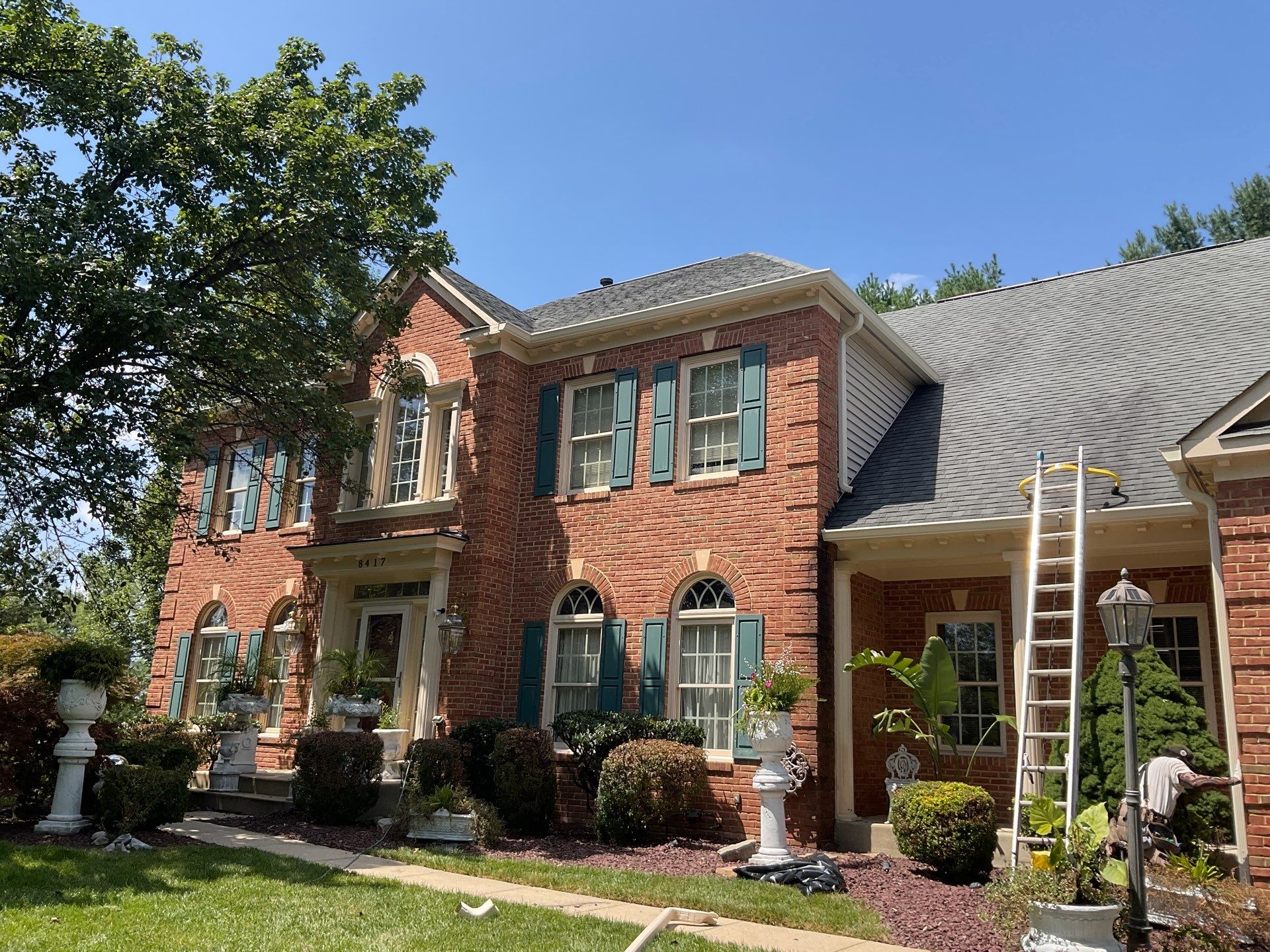 New Gutters, New Floor, New steps, New Paint job by Alpha Design Services