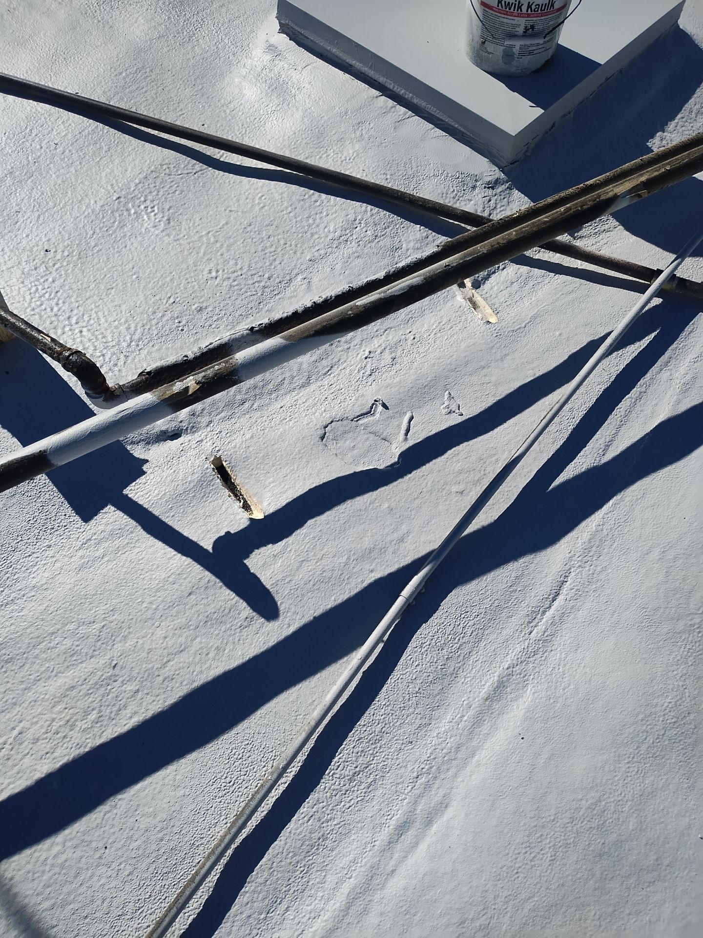 Spray foam and coatings using General Coatings acrylic coatings and spray foam by Straight Edge Roofing Inc