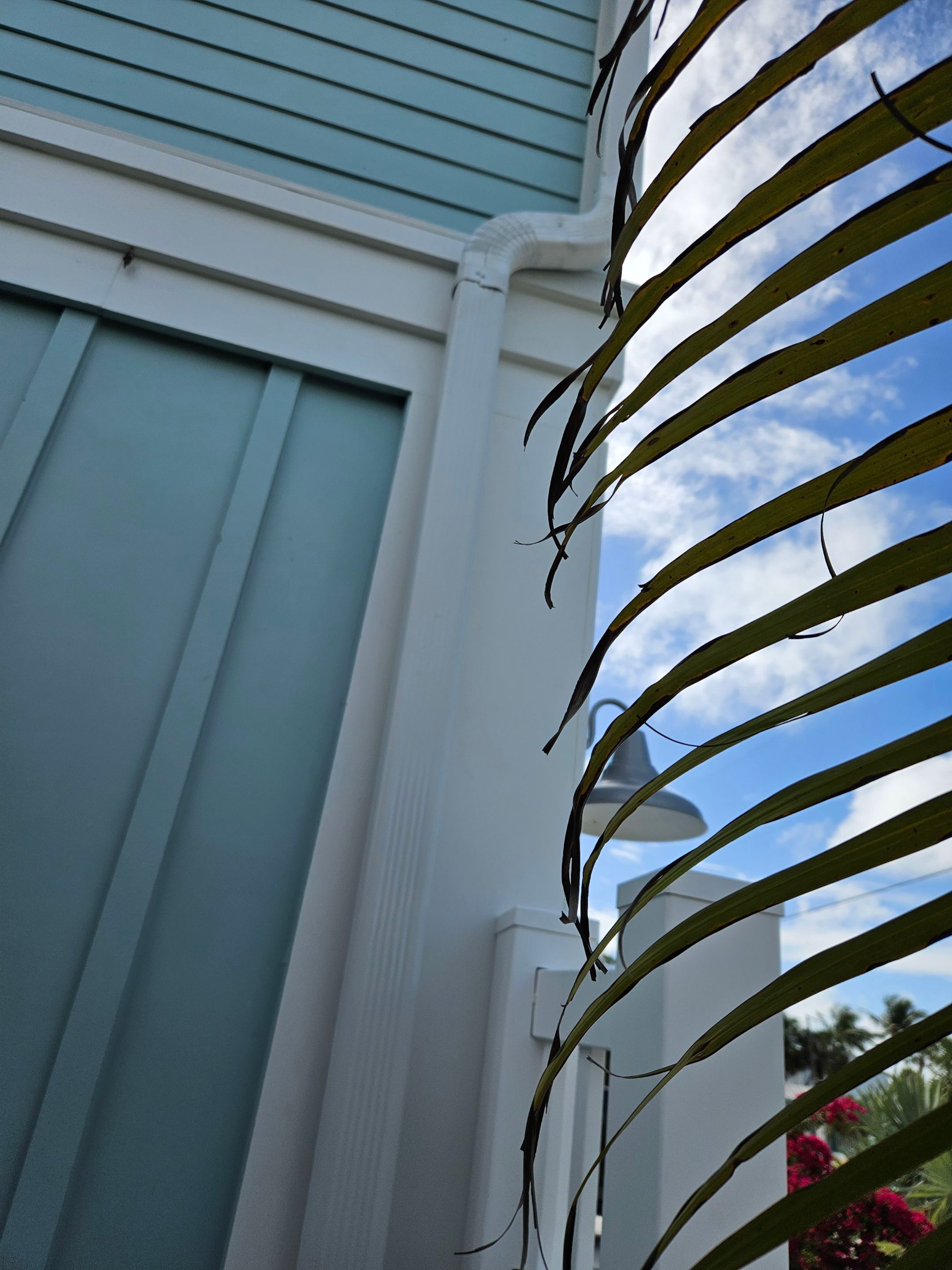 New White Seamless Gutters Installation and Downspouts, Reseal Gutters in Fort Myers Beach, FL  by Gutter Professors