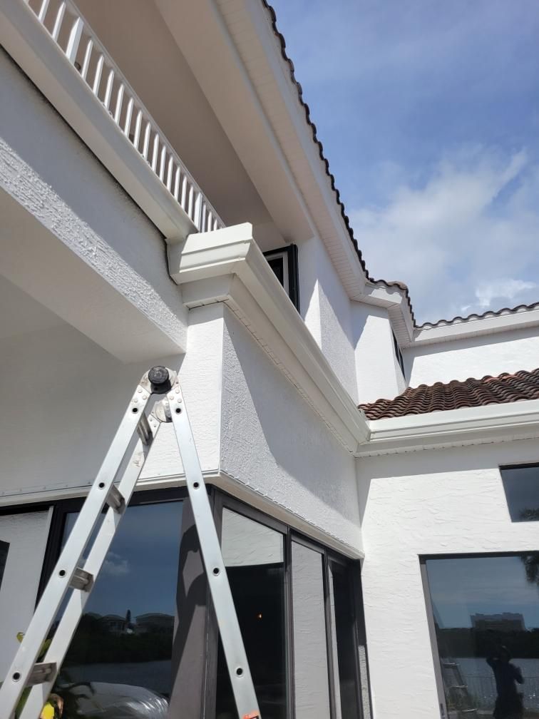 Custom Downspouts with Splash Guards in Sarasota FL by Gutter Professors