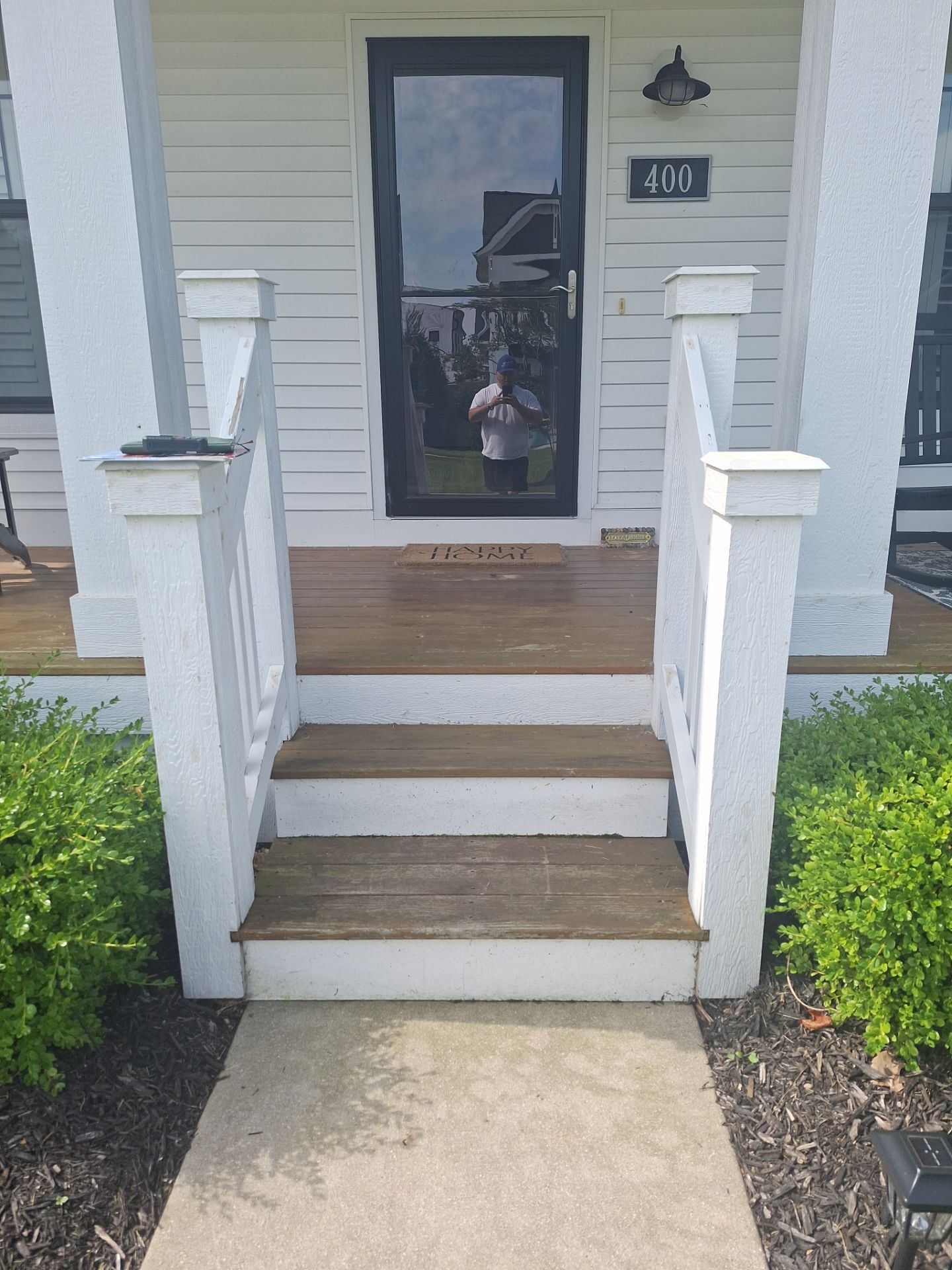 Freshly Stained Deck with Painted Railings by Gordon Painting