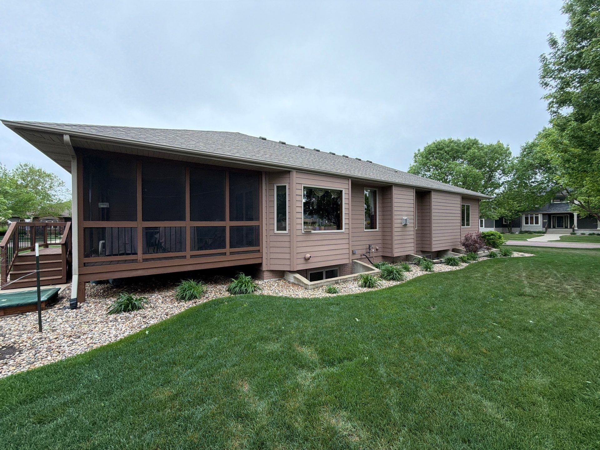 Exterior Painting and Wooden Deck Staining in Sioux Falls by Select Painting, Coatings & Garage Cabinets