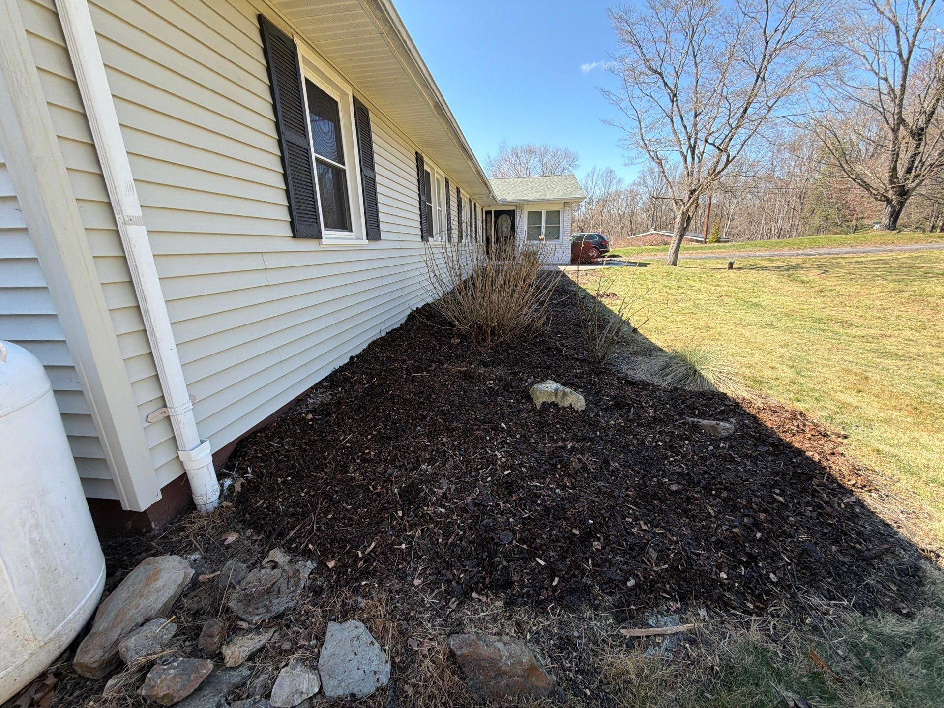 Comprehensive Spring Property Cleanup and Garden Bed Mulching in Orange by Diamond Image LLC