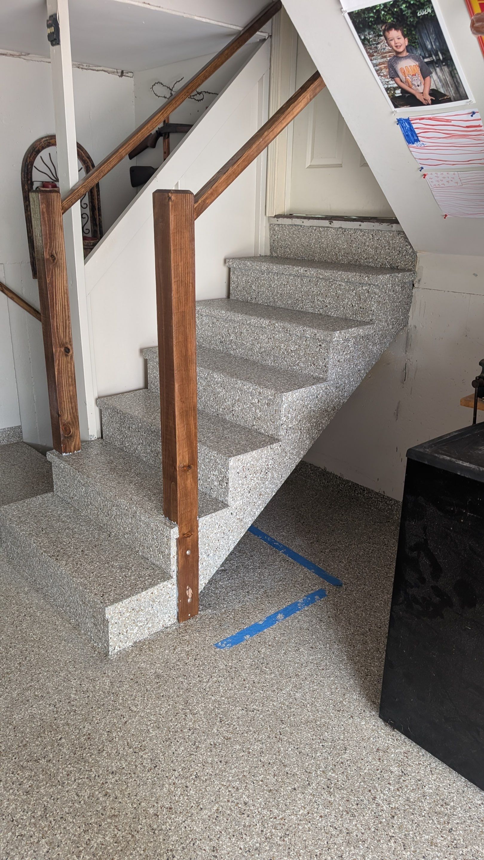 Epoxy Garage Floor Refinishing and Custom Stair Construction in Overland Park by Banner Garage