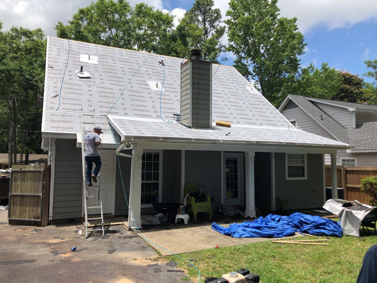 Residential Roofing Installation using Roof Replacement by American Roofing & Construction LLC