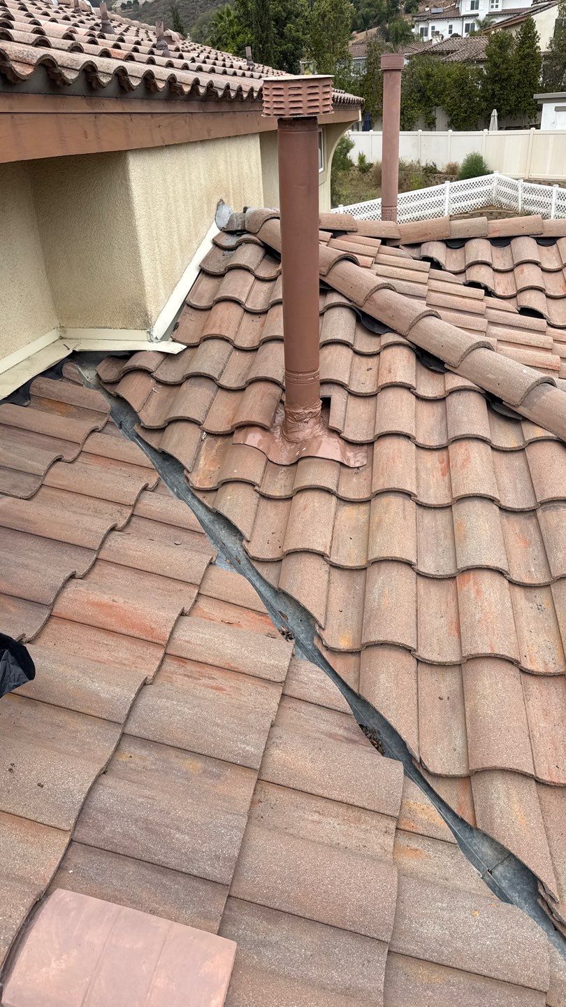 Terracotta Tile Roof Repair and Ridge Cap Sealing in Escondido by Reliable Roofing San Diego Inc.