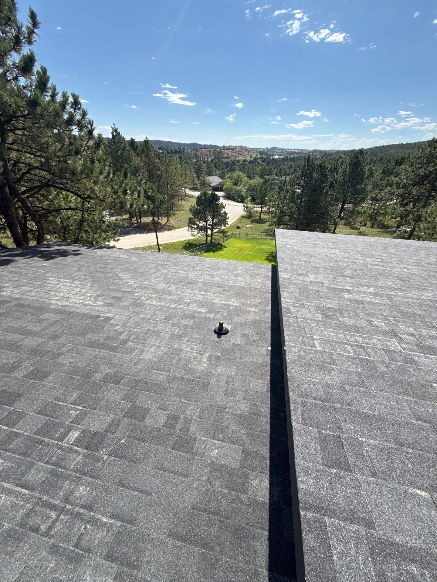 Full Architectural Shingle Installation for Contemporary Rapid City Residence by Weather-Tite Exteriors LLC