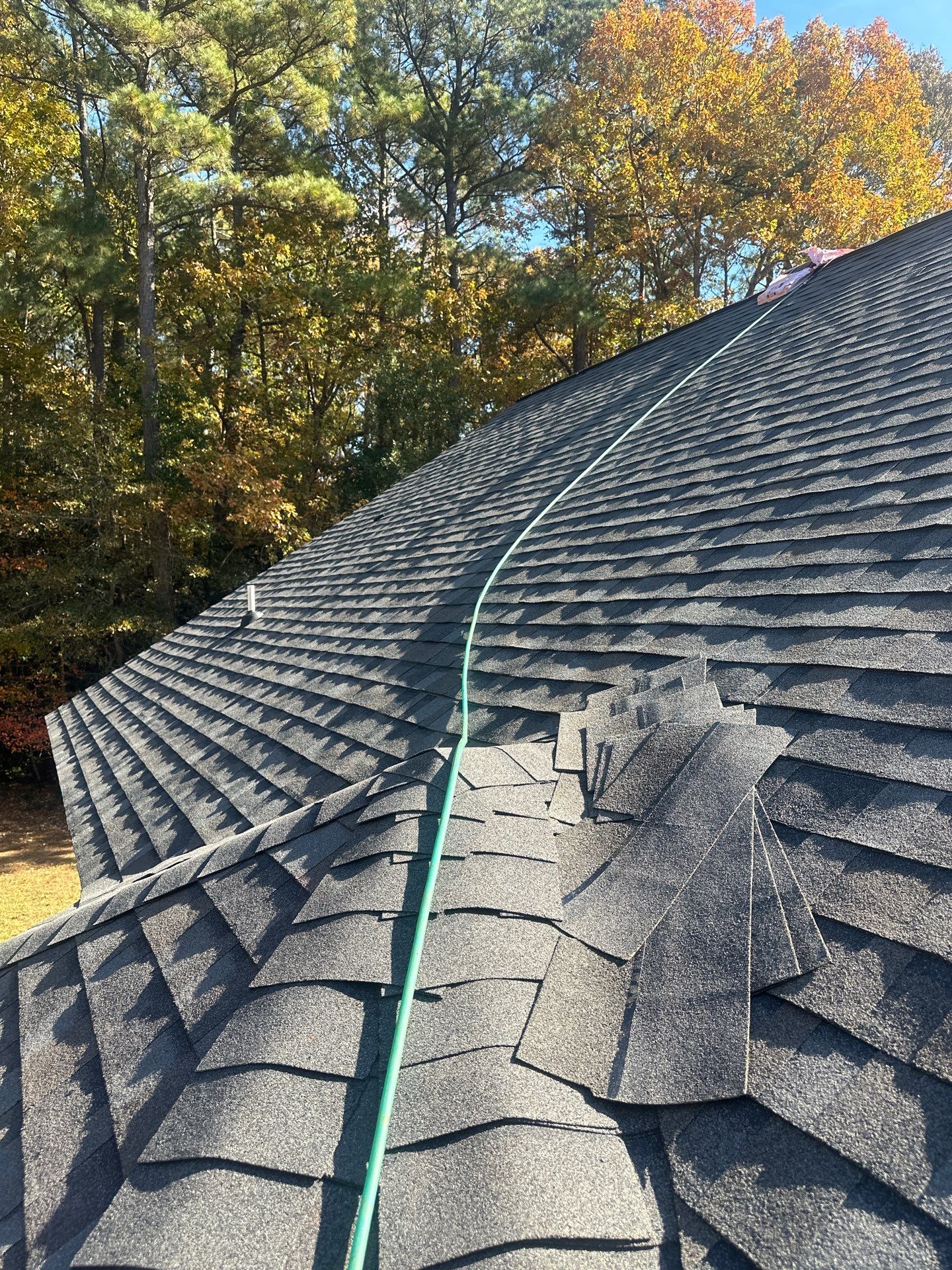 Mathews Residential Roof Replacement Using Owens Corning Duration Shingles by Cade Construction