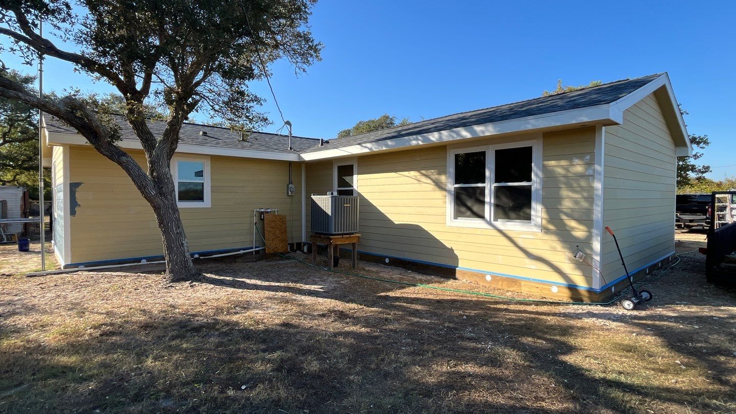 Customized Cabin by Bayfront Roofing and Construction