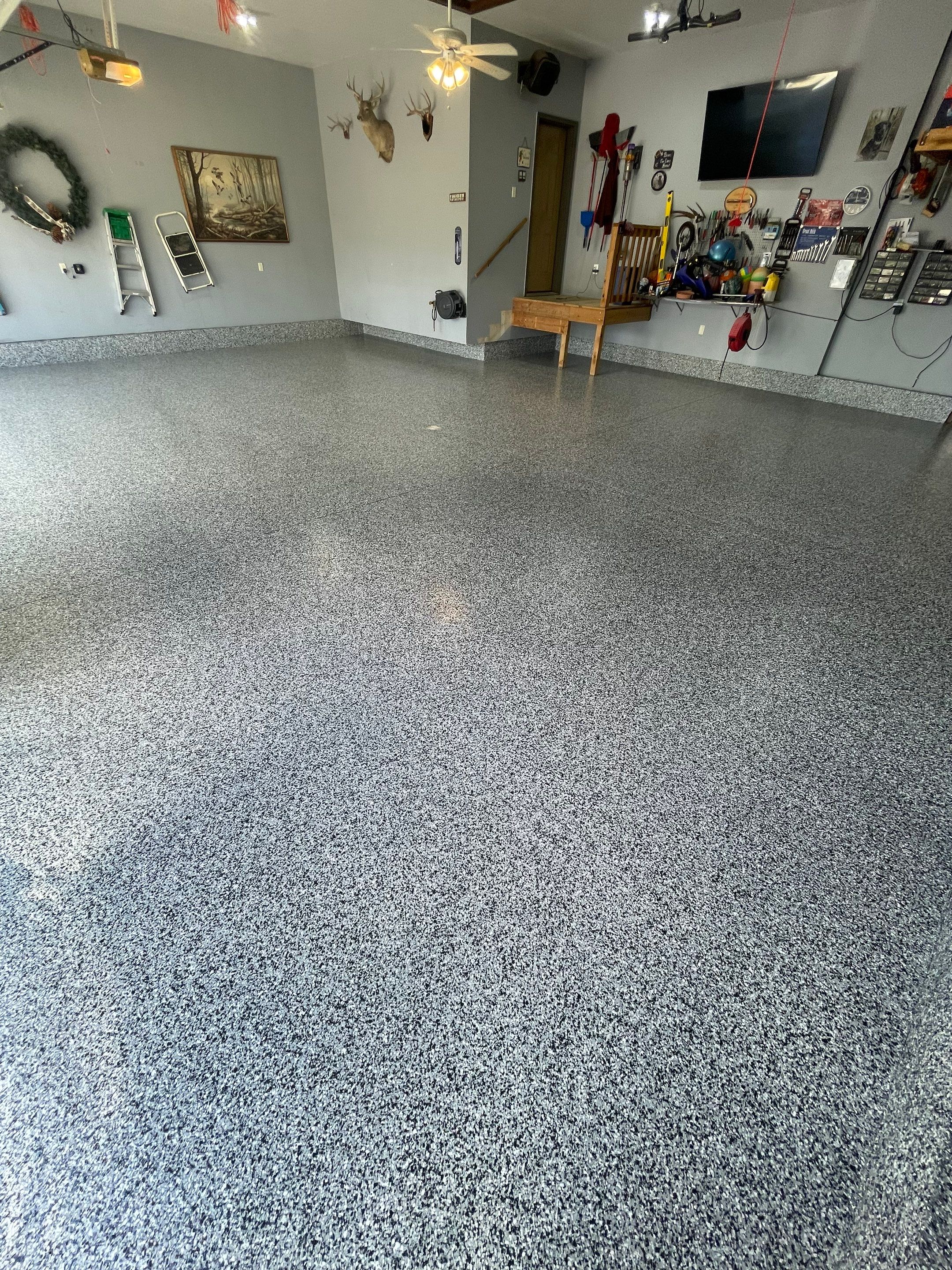 Residential Garage Floor Coating in Sioux Falls by Select Painting, Coatings & Garage Cabinets