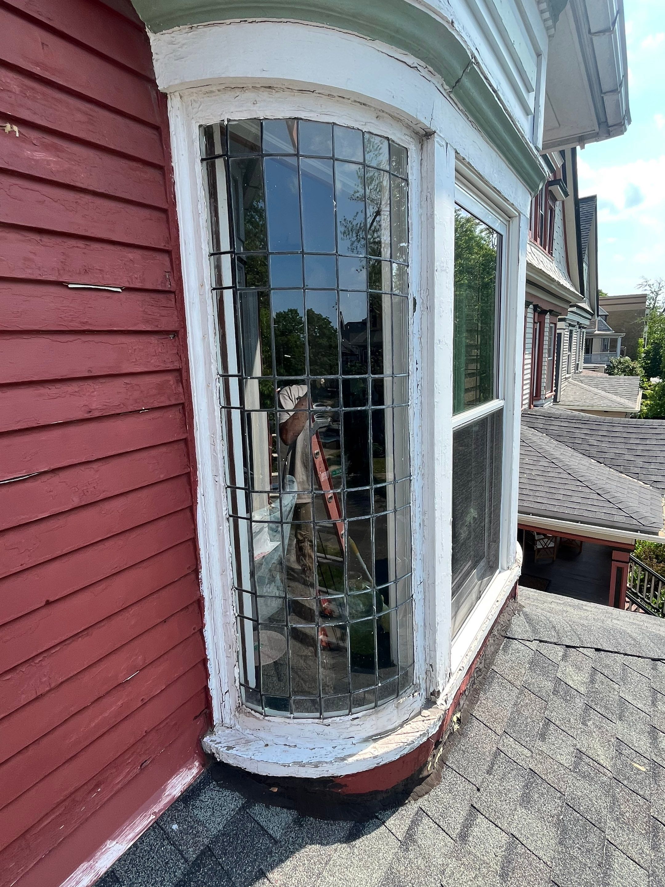 Exterior Renovations- Siding, Stamped Concrete, Porch, and Railings by Ivy Lea Construction