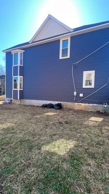 Adding Windows and installing Siding