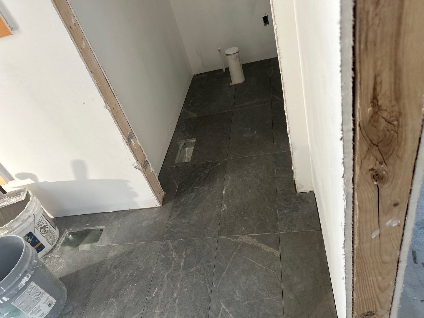 Tile floors, walls, showers, and accent wall for bathrooms  by Footprints Floors of Nashville