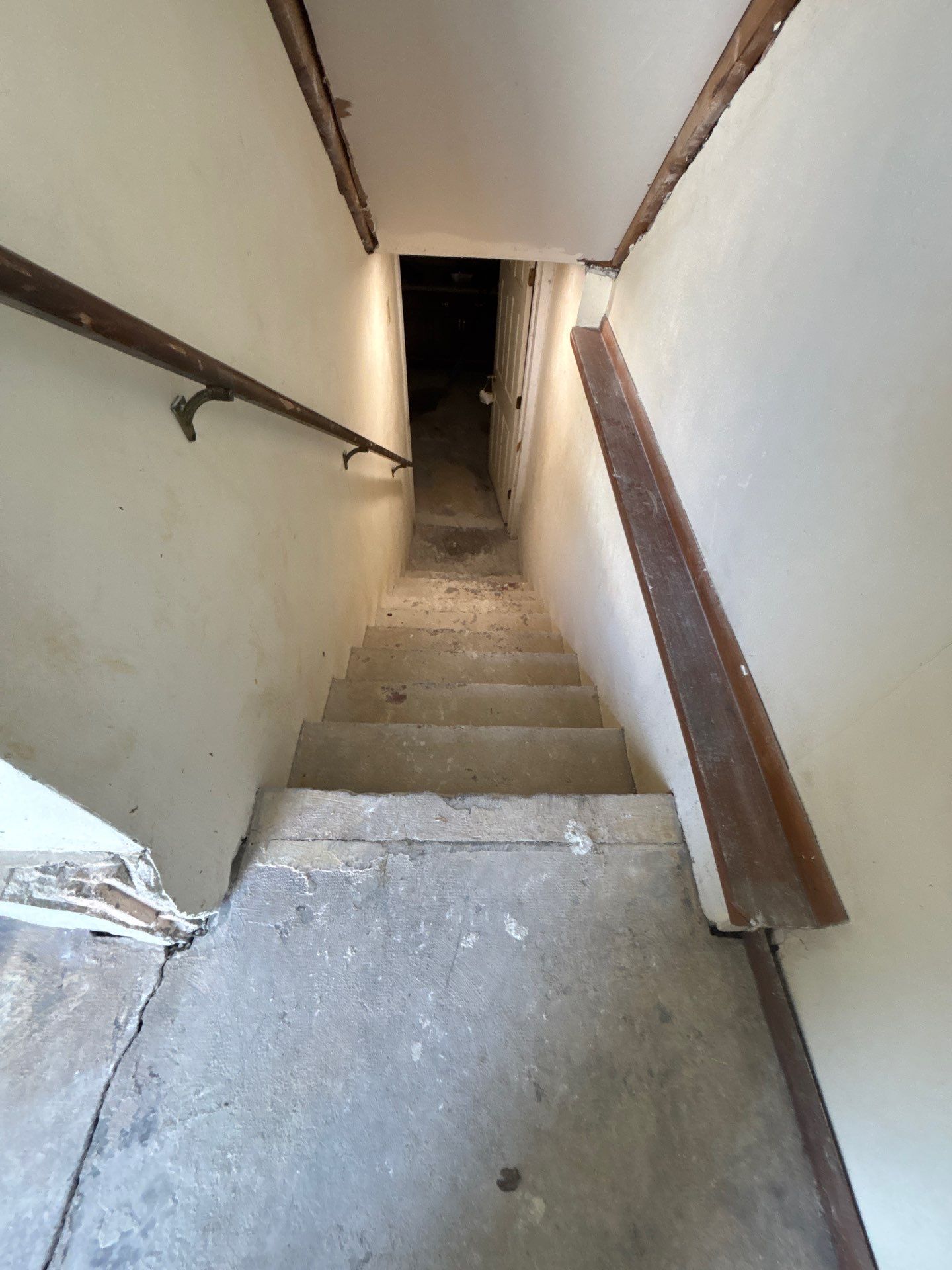 Comprehensive Basement Concrete Floor Coating and Crack Repair in Sioux Falls by Select Painting, Coatings & Garage Cabinets