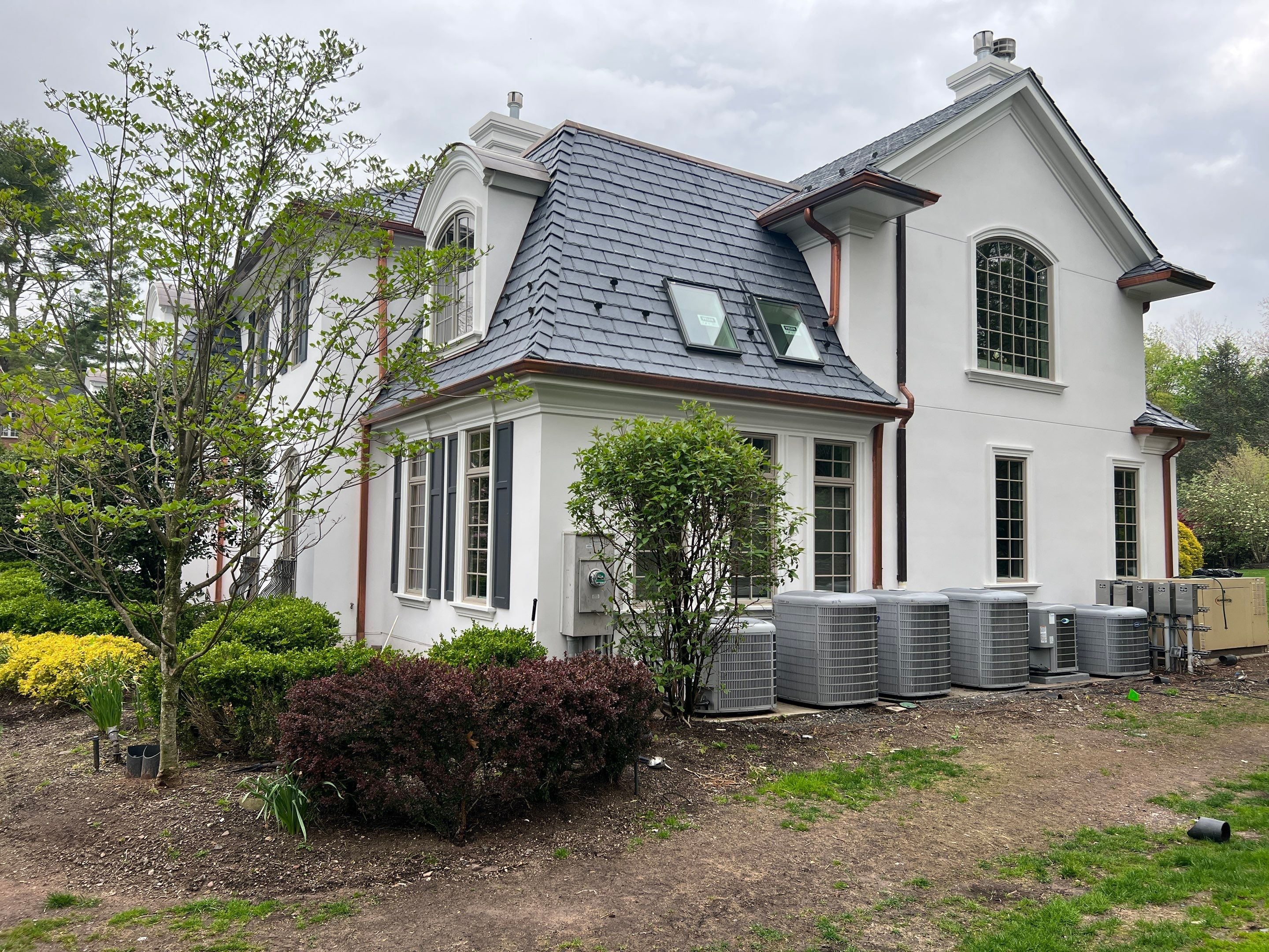 Full Slate - Stucco - Copper Remodel by USA Roof Masters