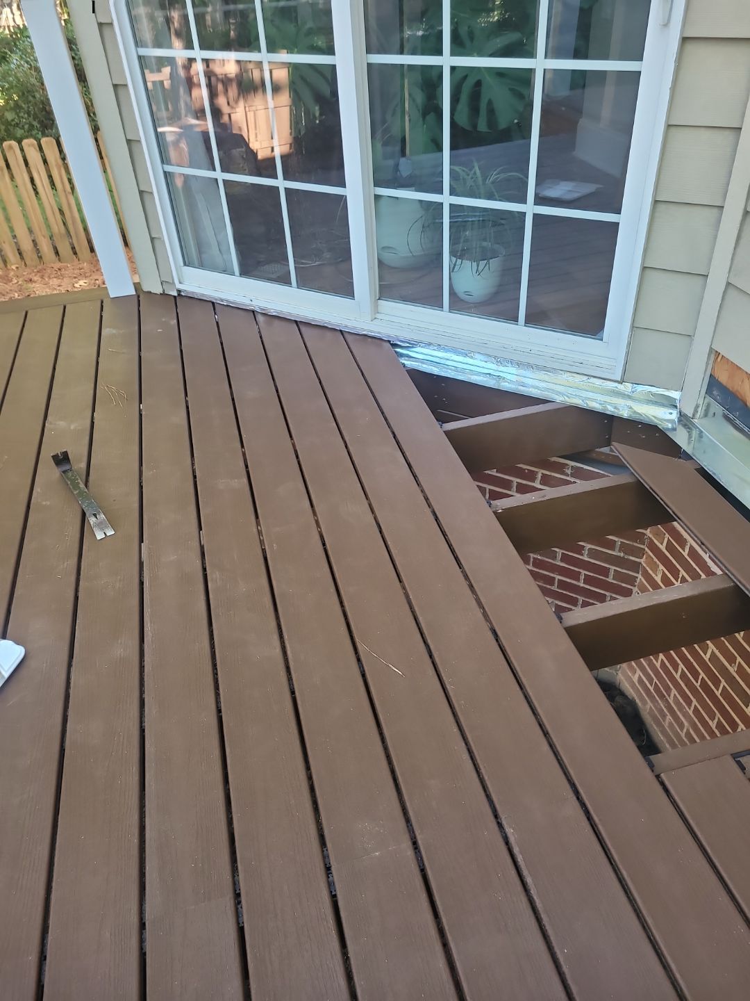 Fuquay-Varina Outdoor Upgrade – Composite Deck & Paved Landing by Elite Remodeling and Design LLC