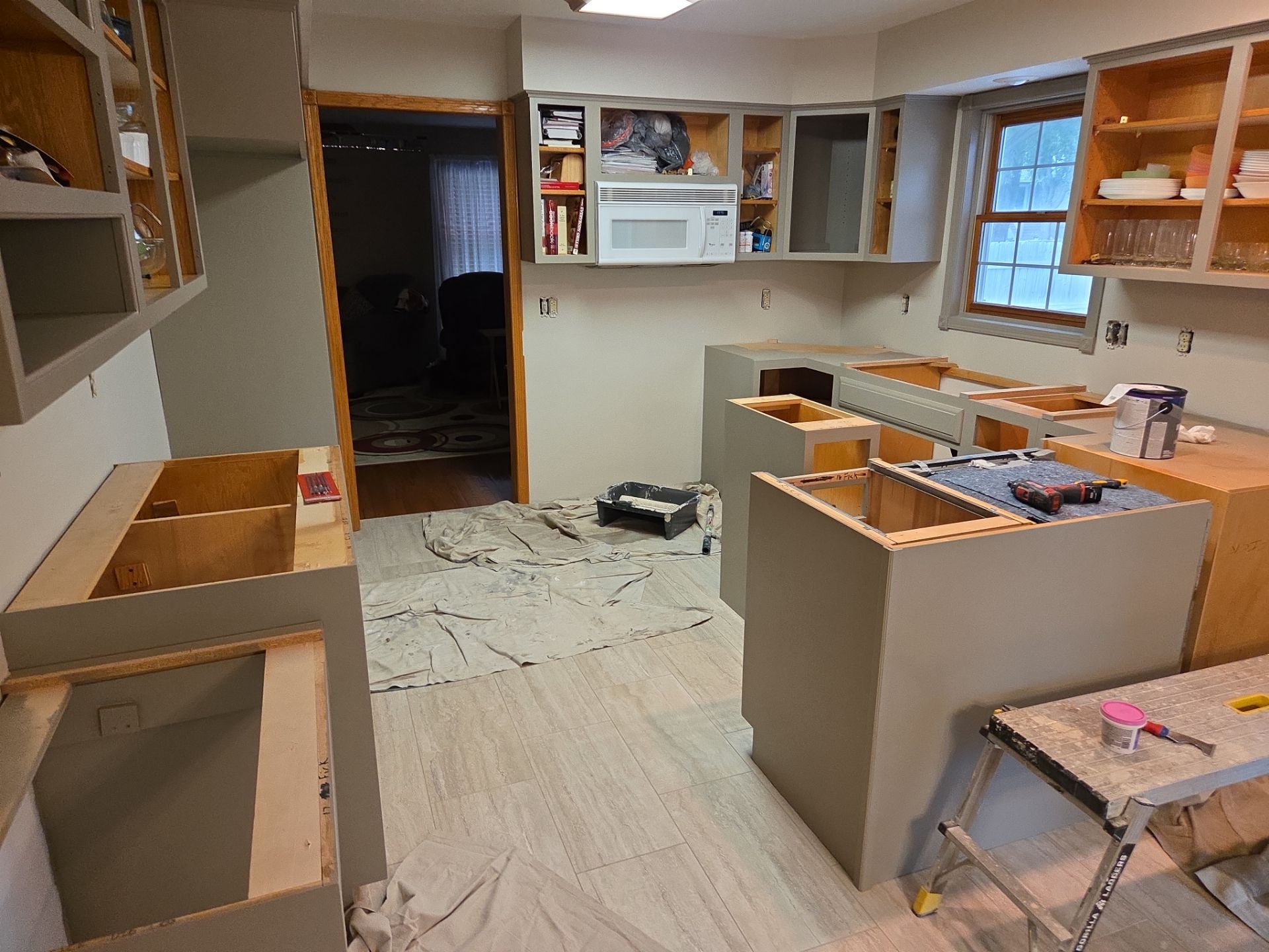 Kitchen Cabinet Painting and Hardware Update in Sioux Falls by Select Painting, Coatings & Garage Cabinets
