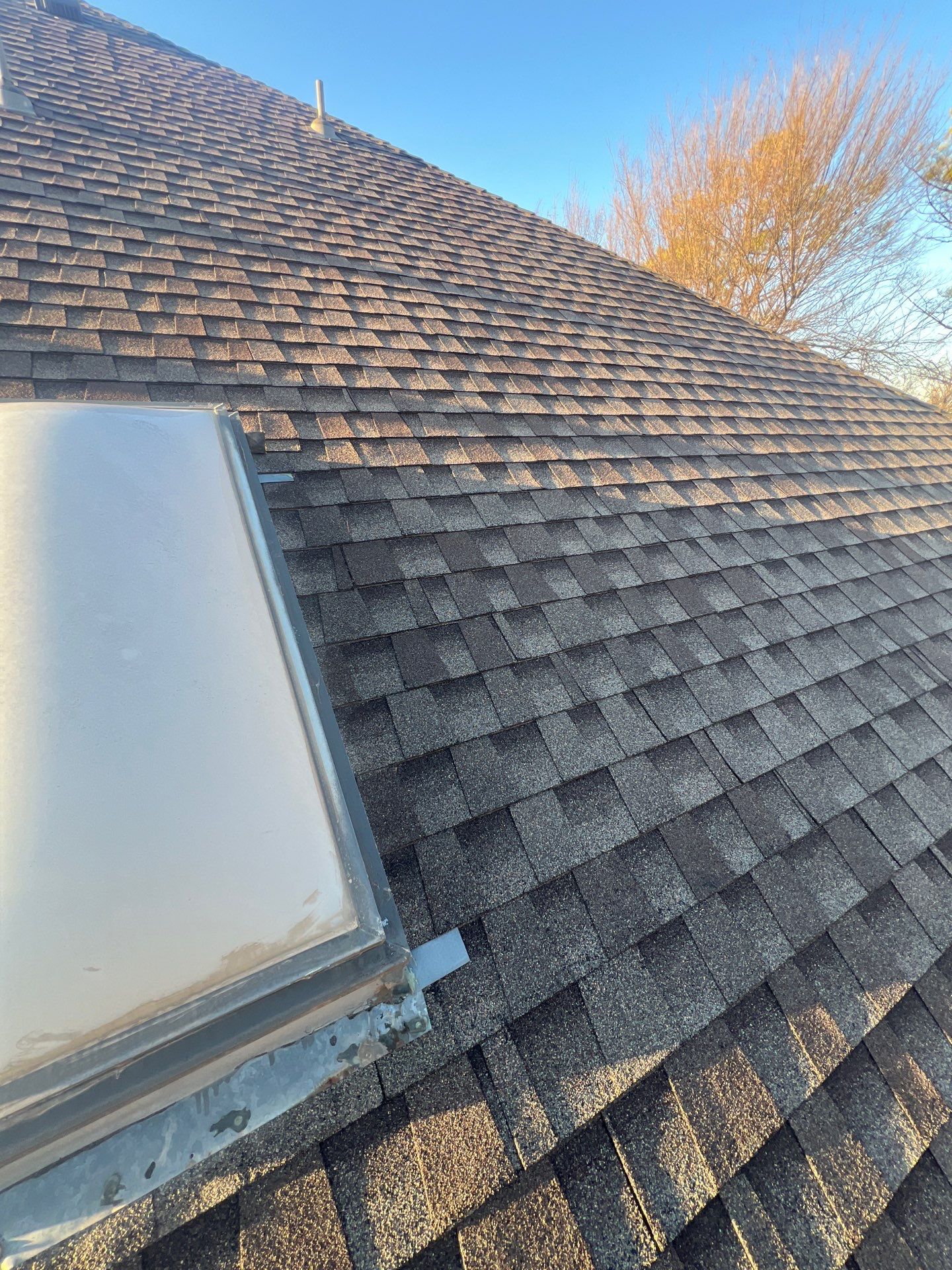 Roof Replacement & Skylight Project in Edmond, OK by McCann's Roofing and Construction