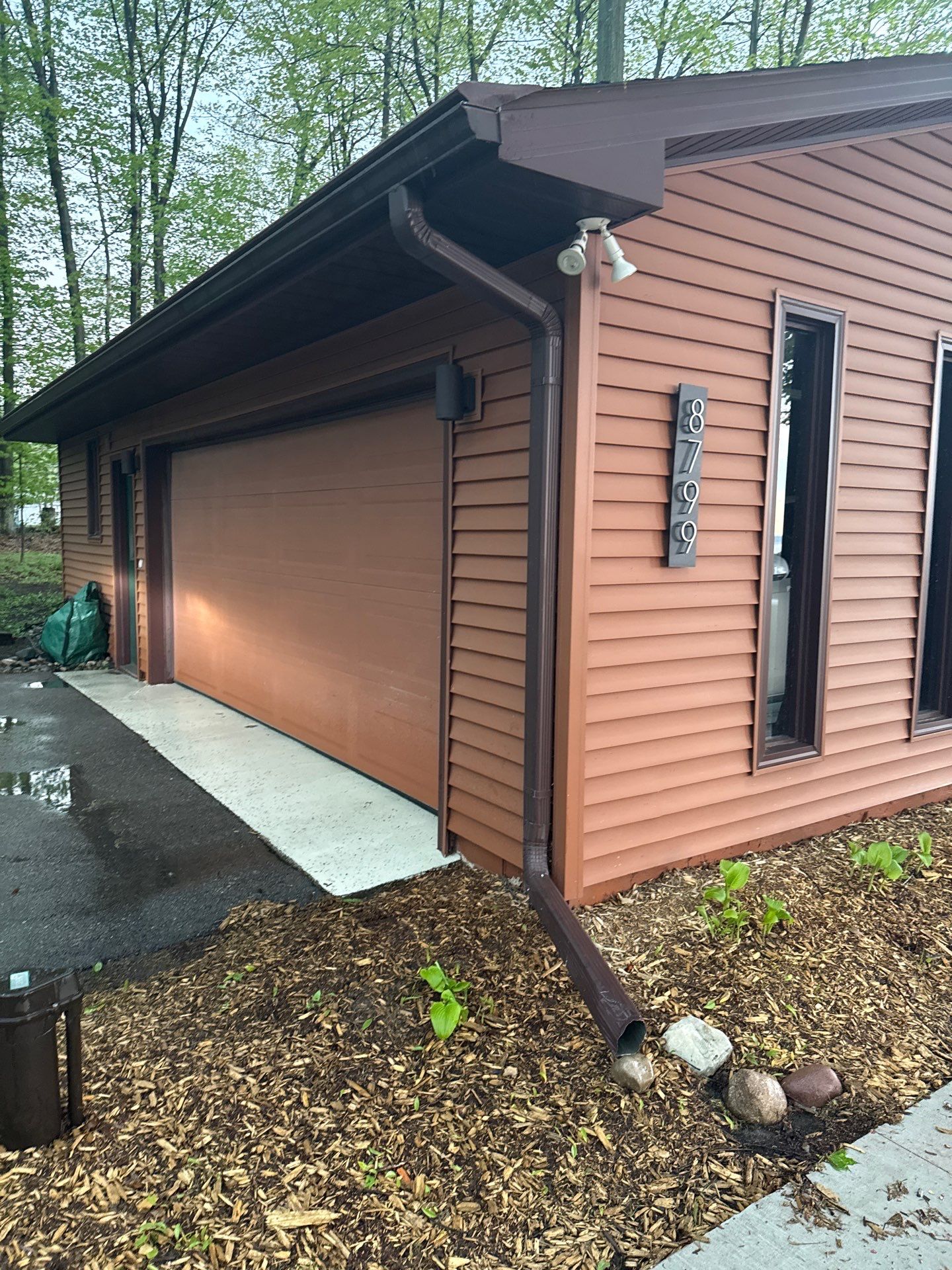 Gutter Protection and Downspout Drainage Installation in Traverse City by Rainbow Seamless Systems