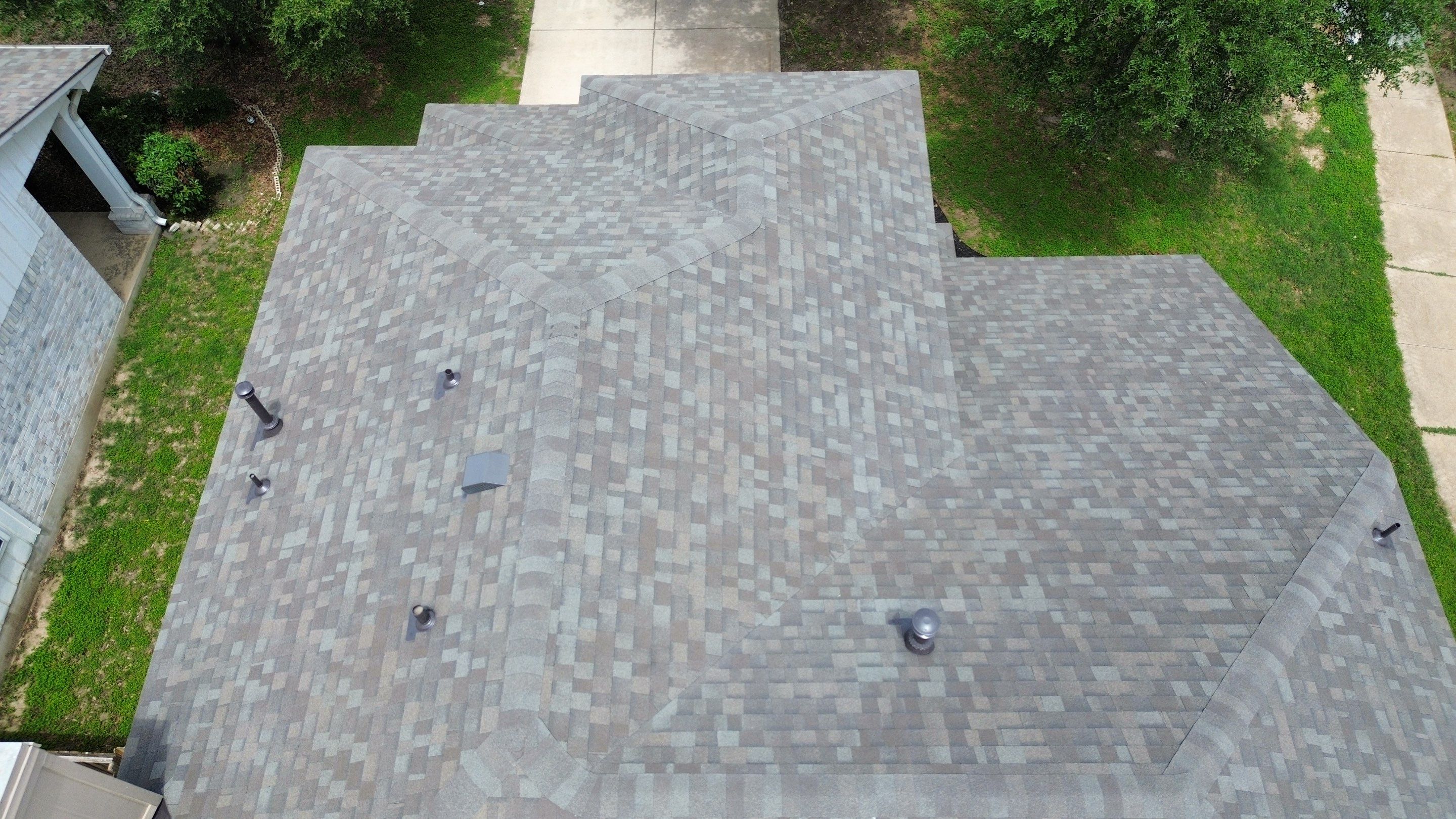 Roof Replacement & Chimney Cricket Upgrade in Cedar Park, TX by Kstylez Roofing & Construction