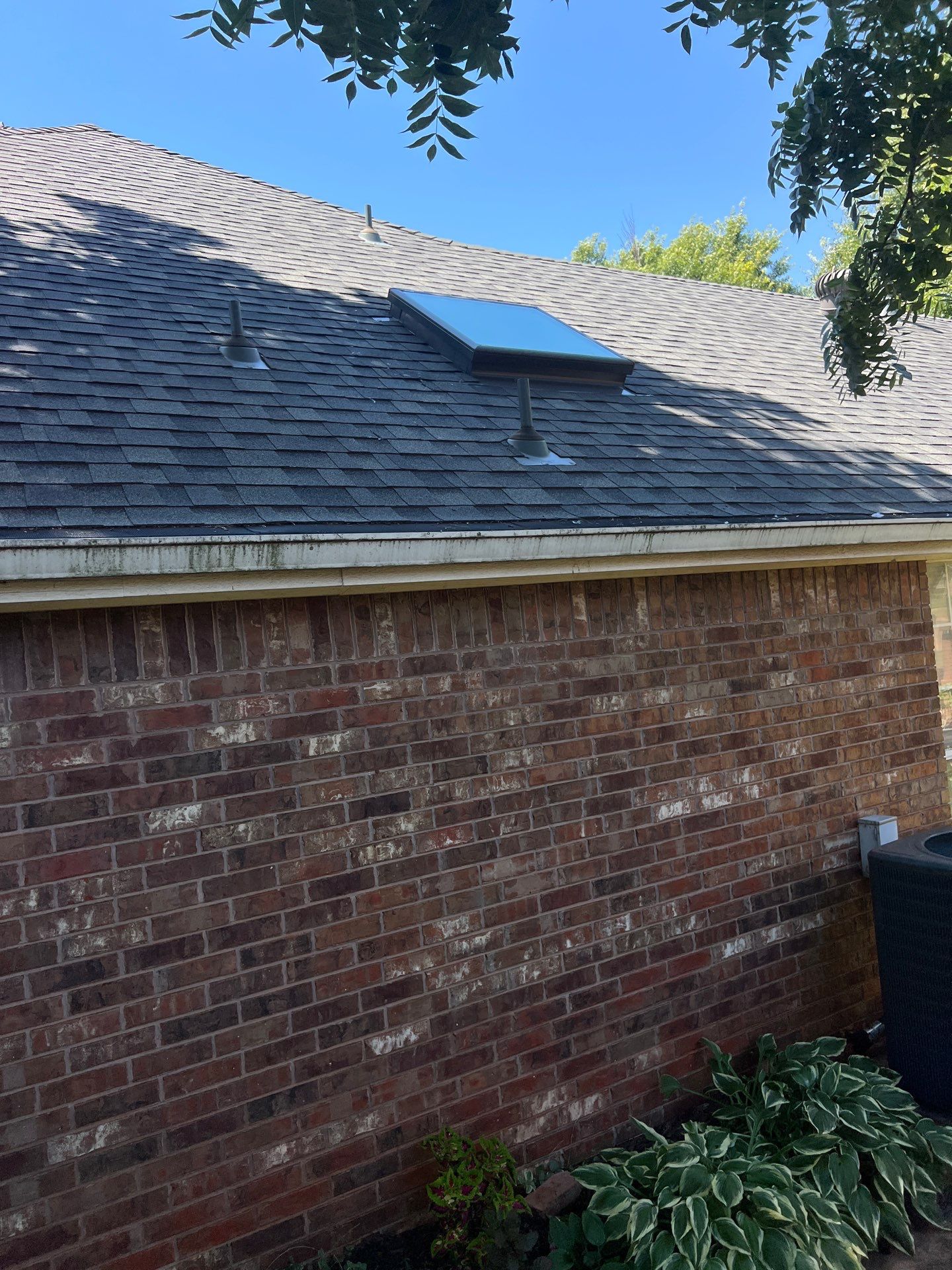 Skylight Replacement in Edmond, OK by McCann's Roofing and Construction