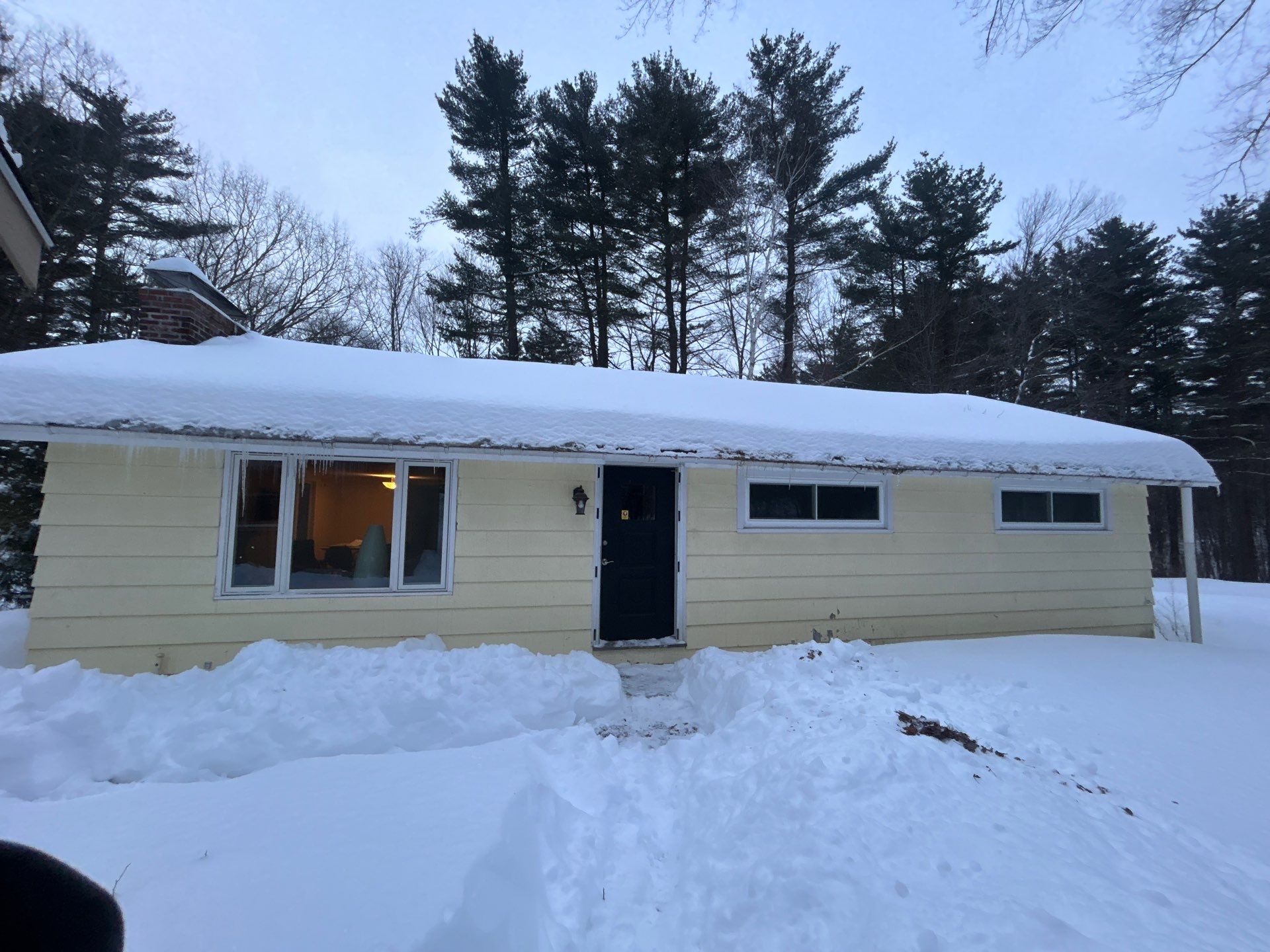 Gutter Installation Project in Stow by Mighty Dog Roofing of Greater Middlesex County