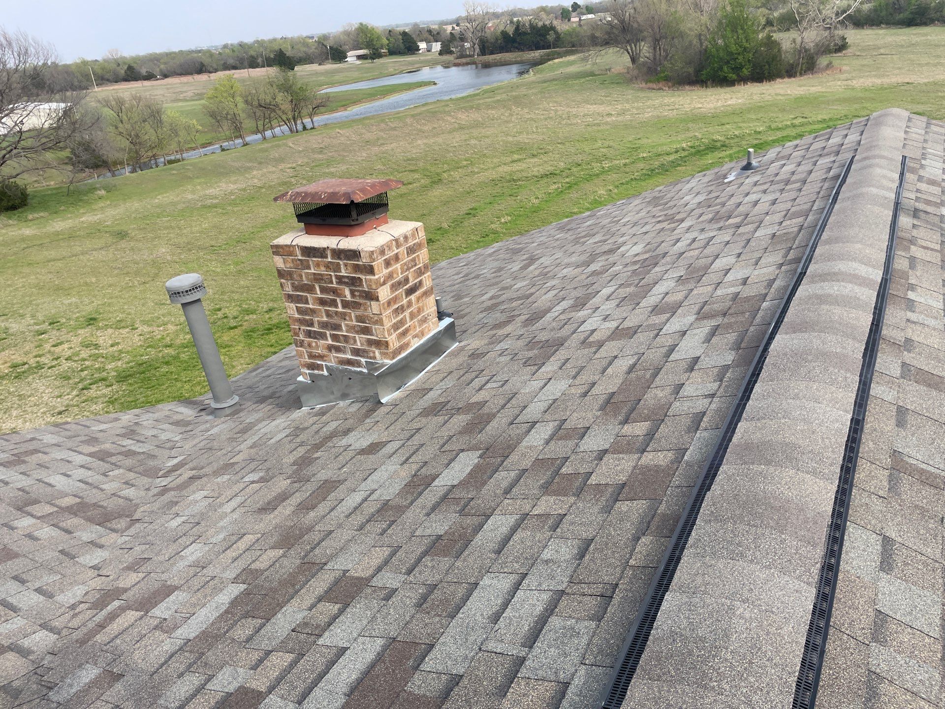 Roof Siding & Window Project in Mustang, OK by Z Construction & Roofing, LLC