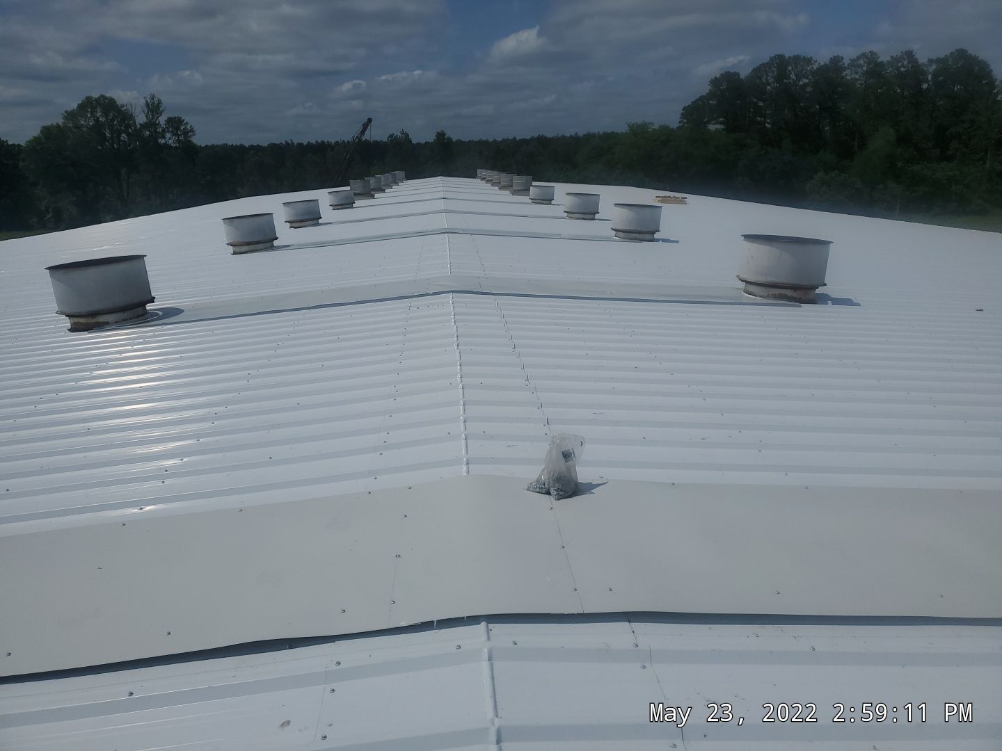 Commercial Roofing Installation using Aluminum Roofing panels by Hostetler Roofing