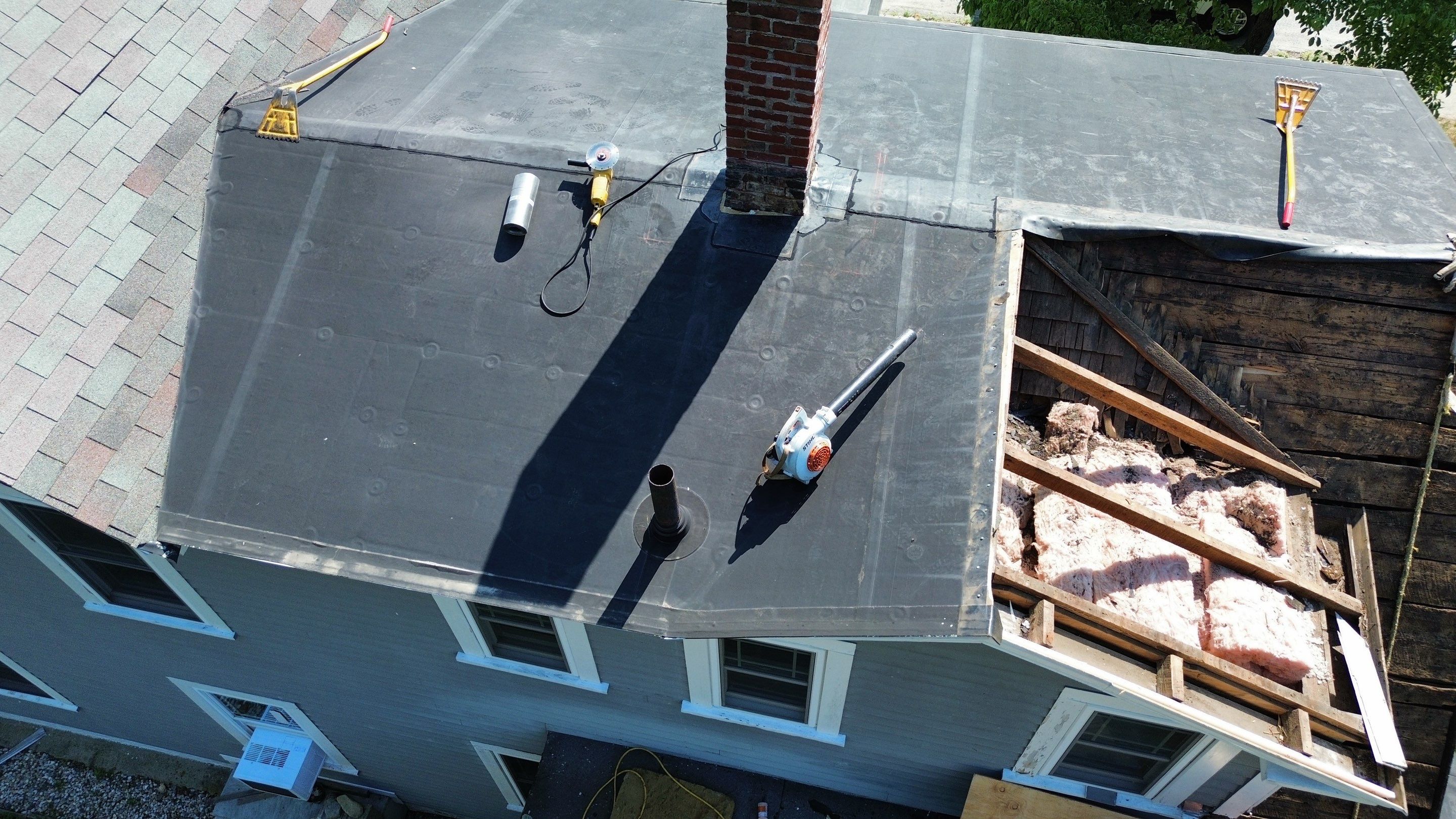 Full Roof Replacement + Custom Gutter Install | Onyx Black Finish by Mighty Dog Roofing of Greater Middlesex County