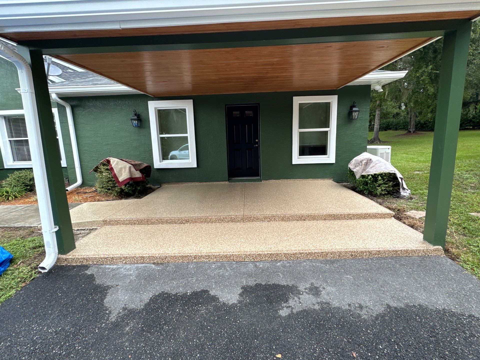 Porch Project in Reddick, FL in Pecan by Cross Creek Concrete Coatings