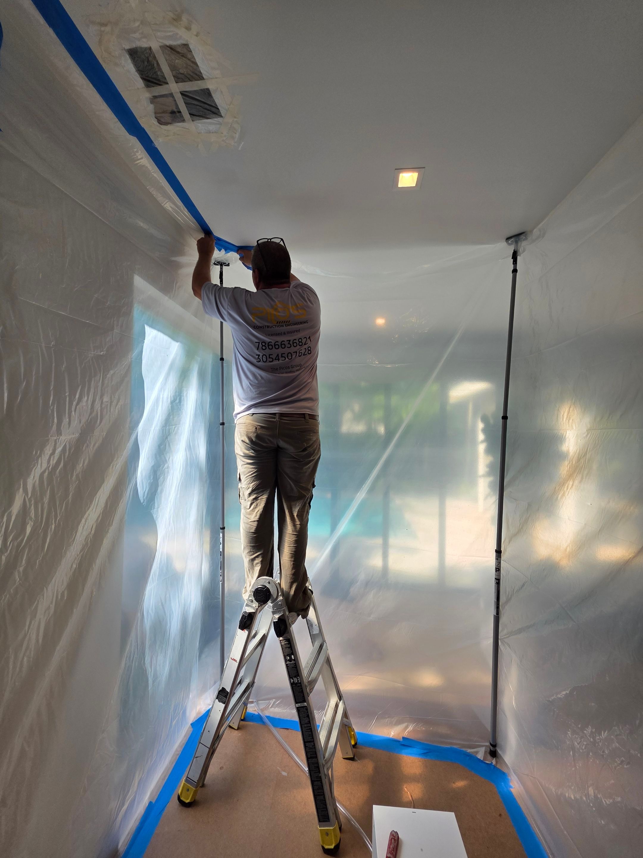 Flat Roof Silicone Coating and Interior Water Damage Restoration in Miami by Picos Construction Engineering