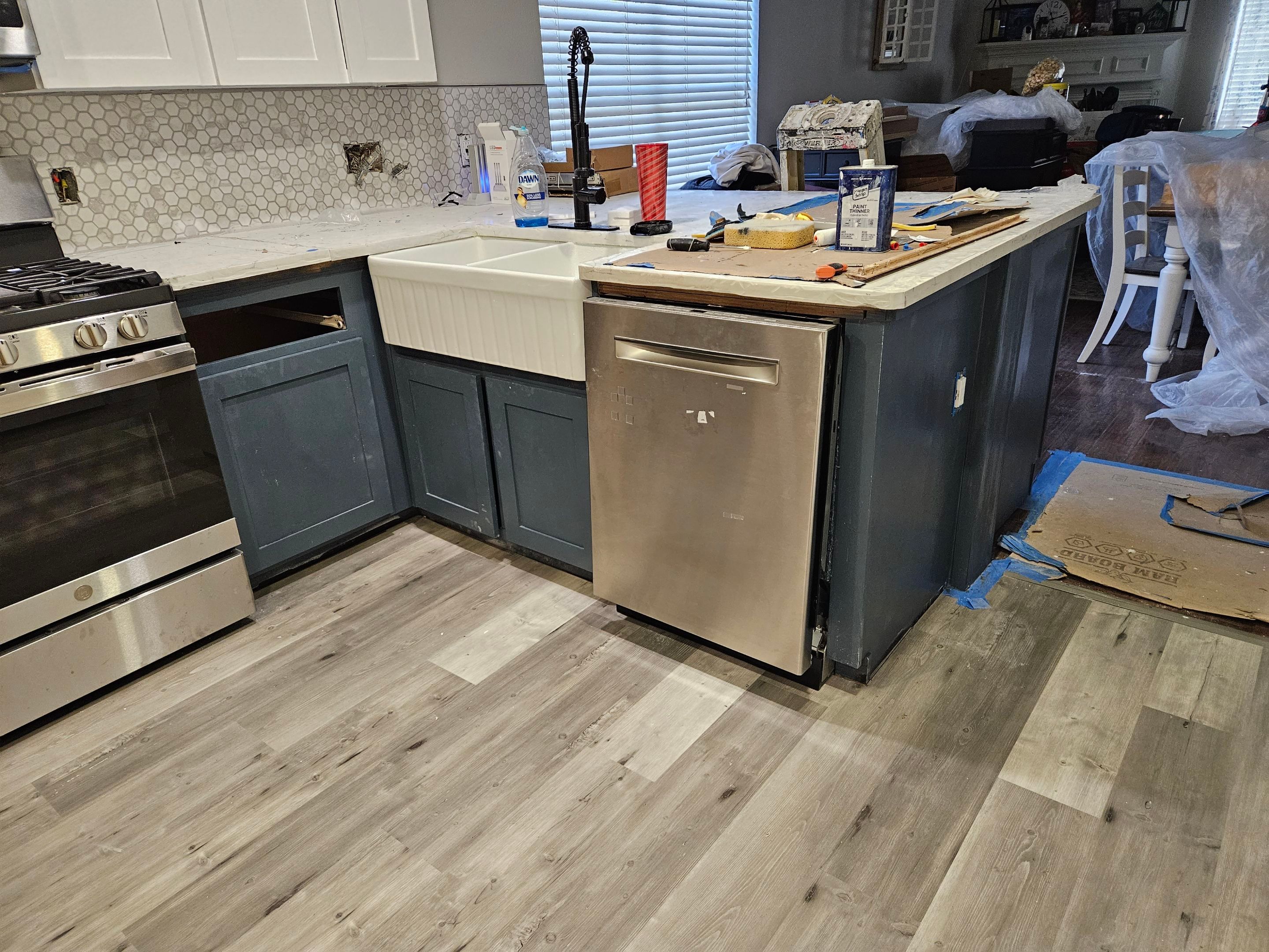 Modern Kitchen Remodel with Blue Cabinetry by Majesty Construction