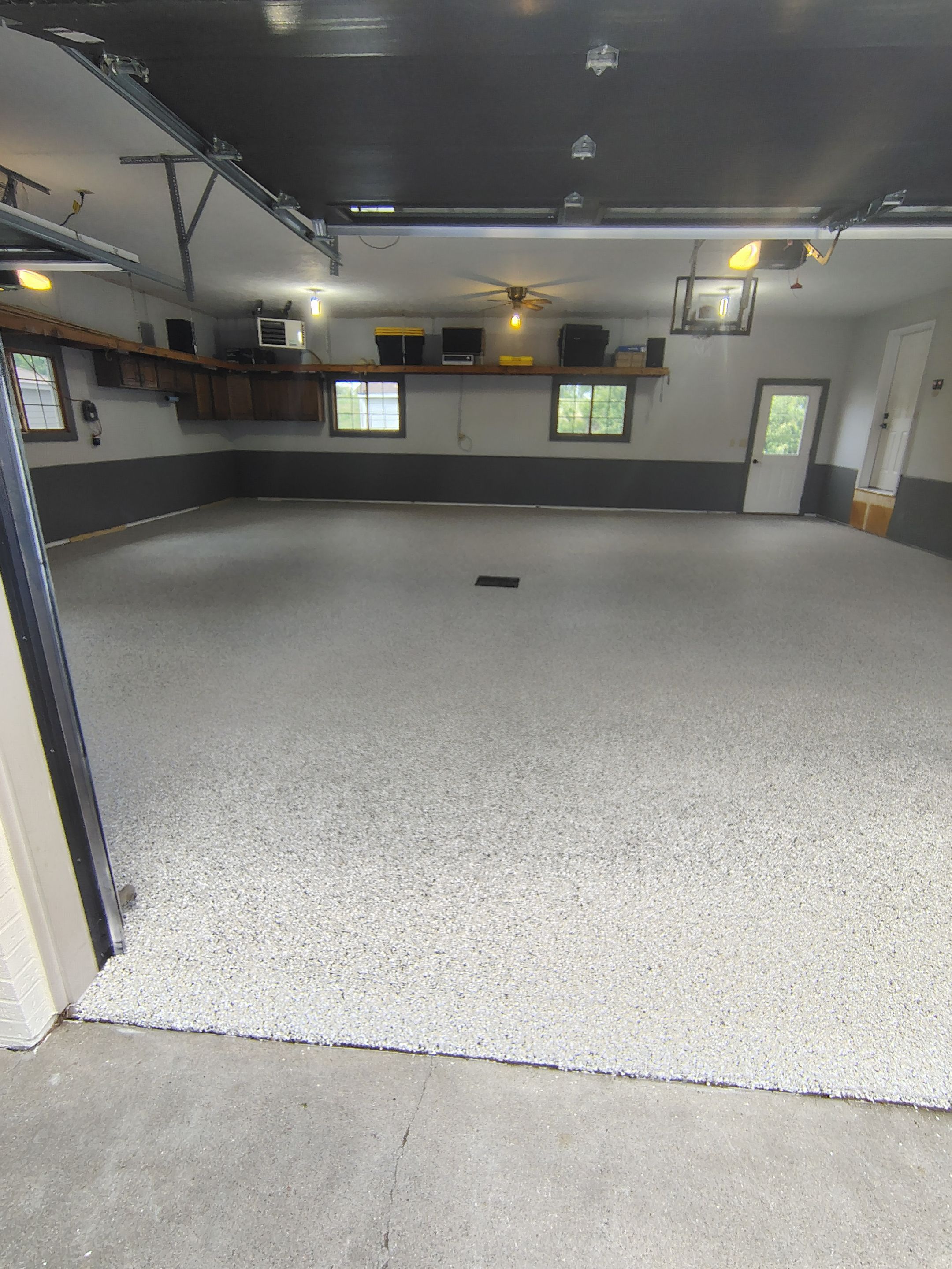 Multi-Fleck Epoxy Garage Floor Coating in Dell Rapids by Select Painting, Coatings & Garage Cabinets
