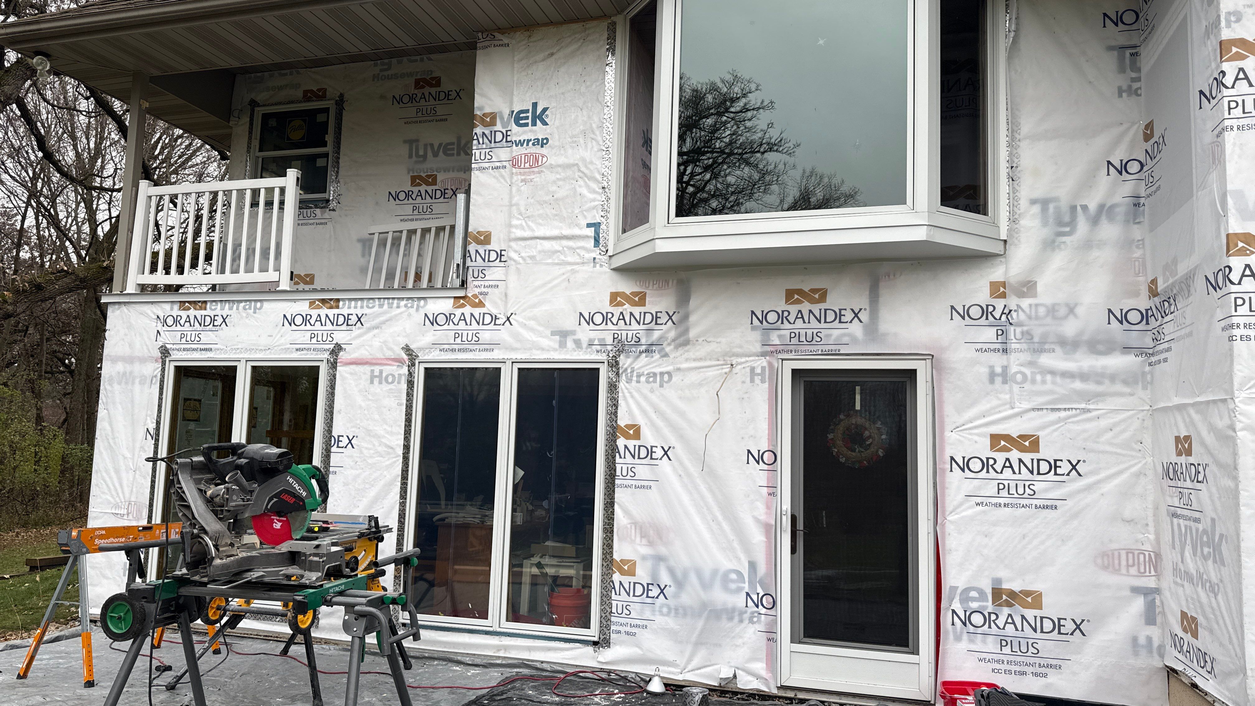 A Clean Window Upgrade Ready for New Siding with Pella Lifestyle Series by United Windows and Siding LLC