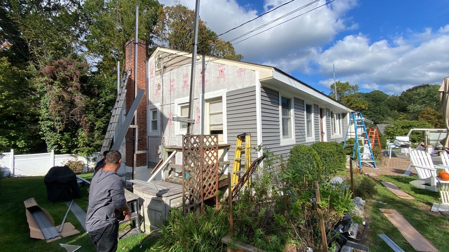 Siding Installation using CertainTeed monogram 4" double 4 Charcoal Gray by A Plus Exterior