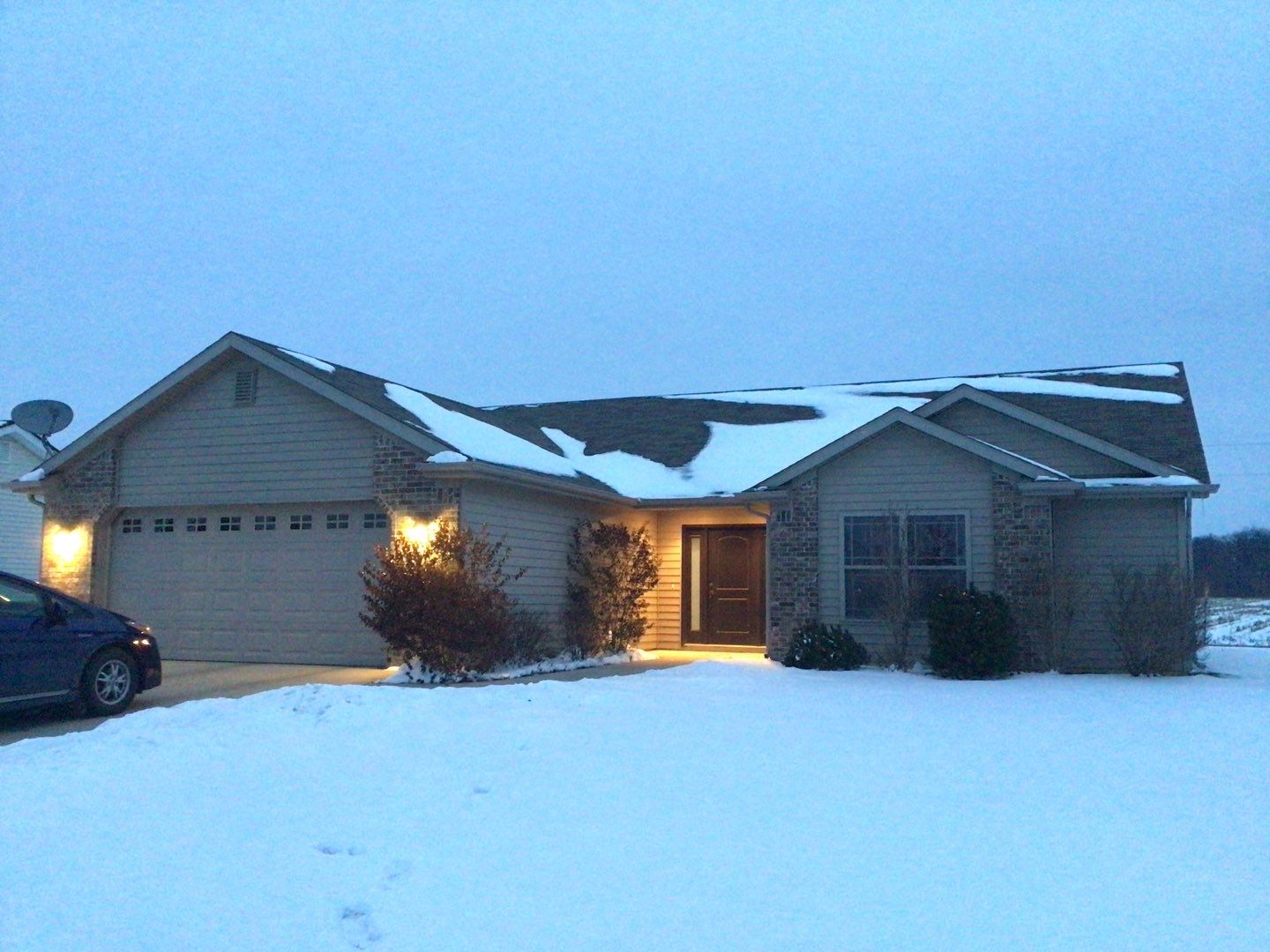 Burgundy Exposed Fastener Metal Roof in Columbia City, Indiana Country Home by 4Ever Metal Roofing